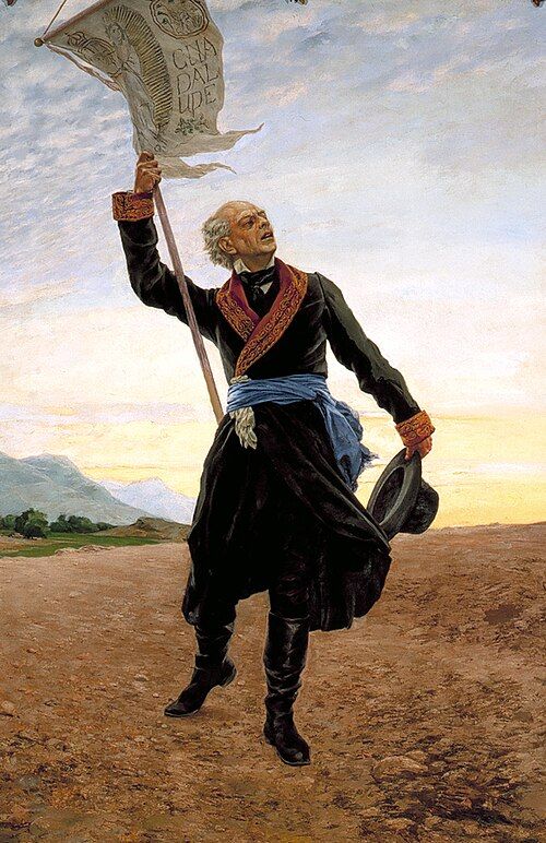 Miguel Hidalgo y Costillo carrying banner