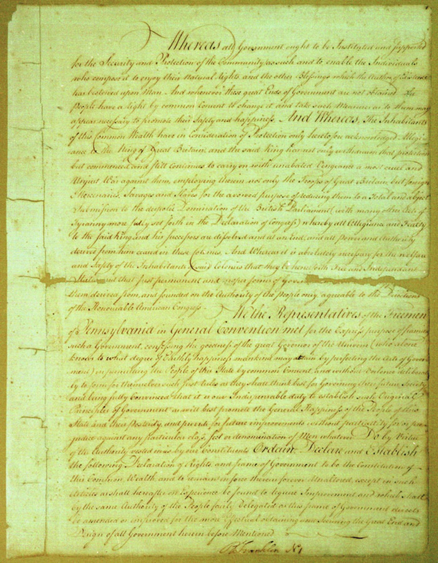 Photograph of a handwritten manuscript page in brown ink on aged paper, opening with the word "Whereas" in a large flourished hand and closing with a signature at the foot