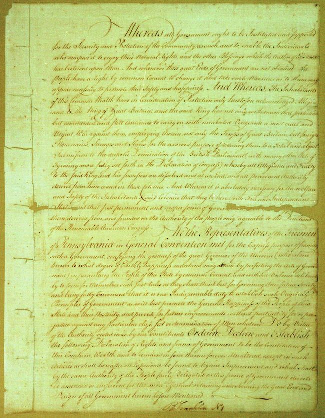 Photograph of a handwritten manuscript page in brown ink on aged paper, opening with the word "Whereas" in a large flourished hand and closing with a signature at the foot
