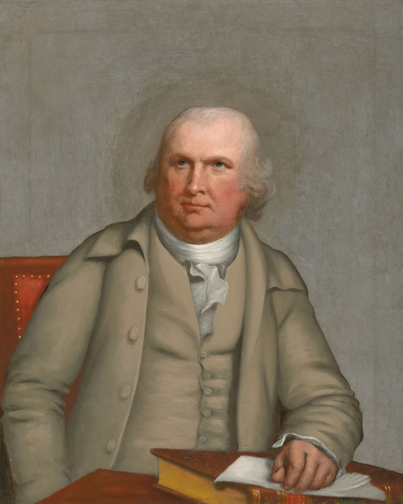 Portrait of an elderly man in beige coat seated at a table with documents, 18th century style painting.