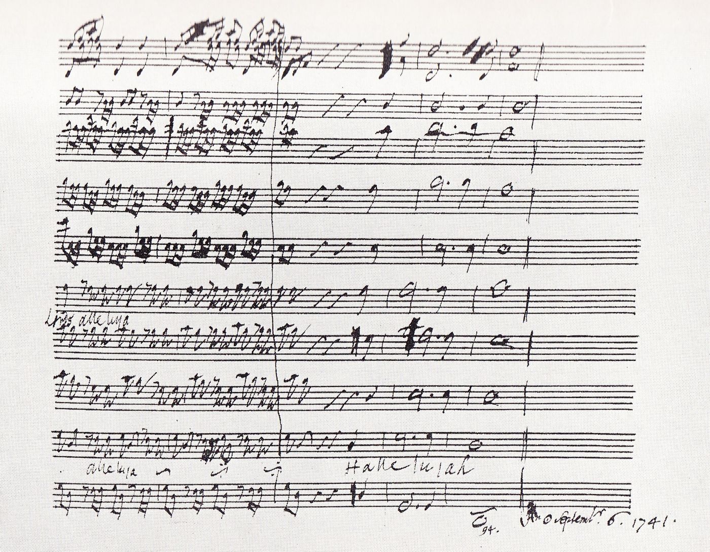 Page of handwritten music in ink, with ten staves of quickly written notes, the word Hallelujah under the bottom lines, and a dated signature in the lower right corner