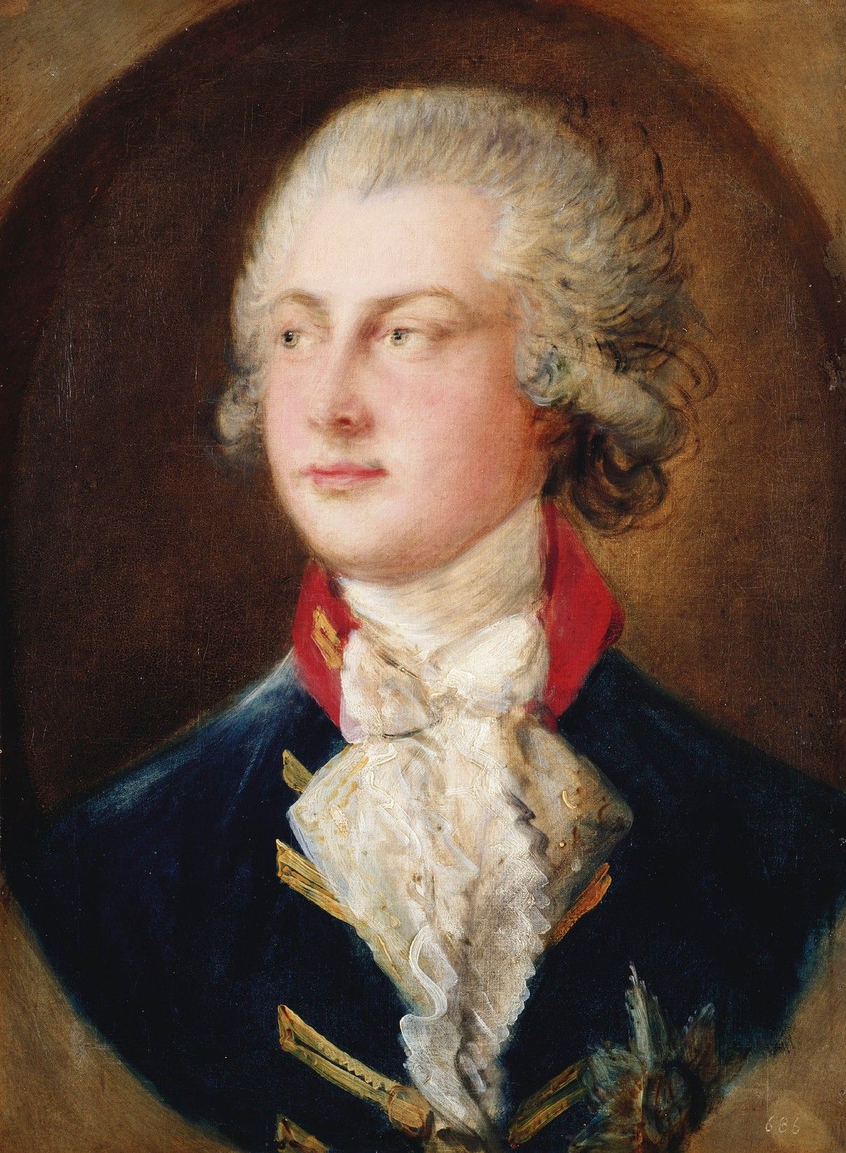 Oval oil portrait of the young Prince of Wales with powdered curled hair, a lace cravat and a dark blue coat with a red collar and gold braid