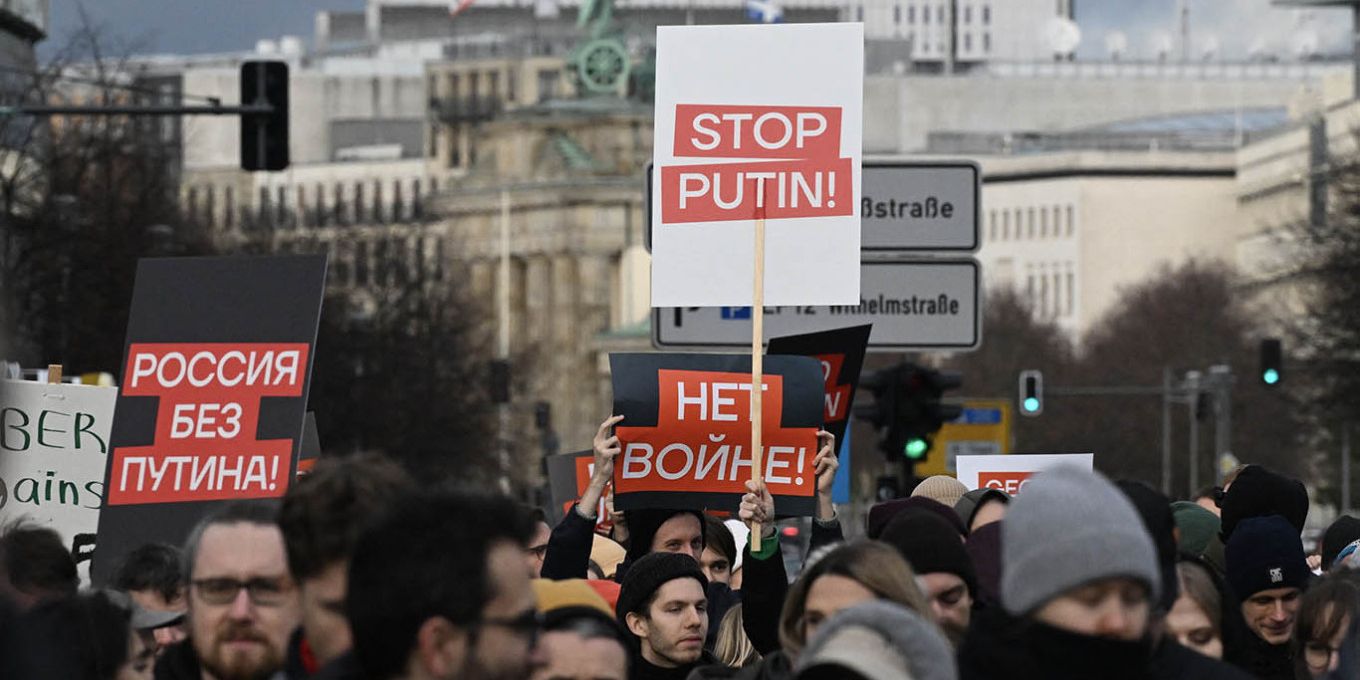 Protesters hold signs reading "Russia without Putin", "No to war" and "Stop Putin during a demonstration of supporters of Russia's exiled opposition in Berlin.Ralf Hirschberger / AFP