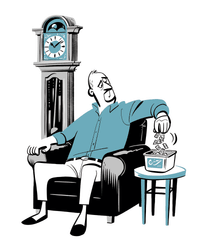 Danny sitting in an armchair looking through his medicines