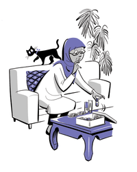 Hanna sitting on the sofa looking through her box of medicines