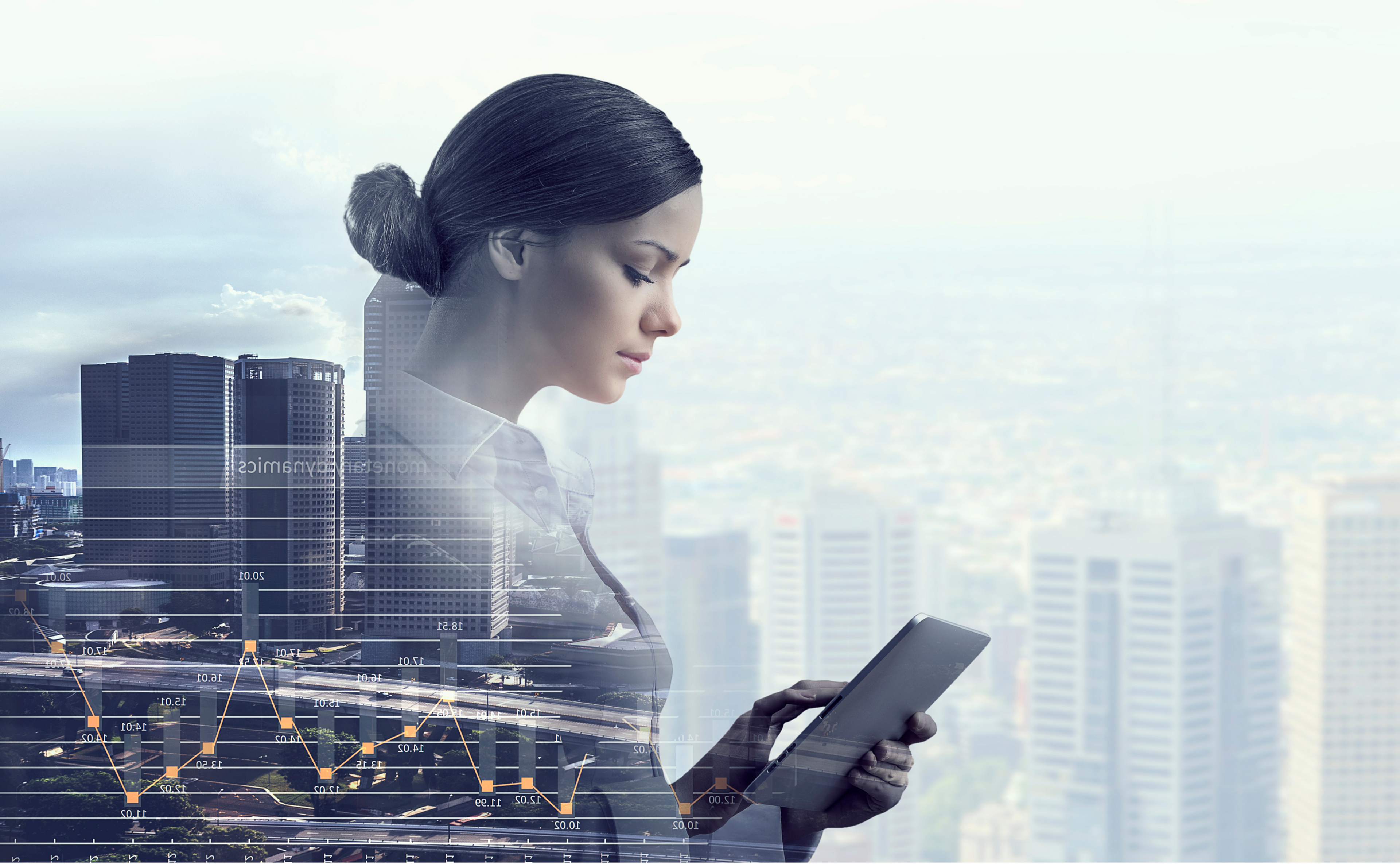An image of a woman looking at a tablet computer with a cityscape in the background