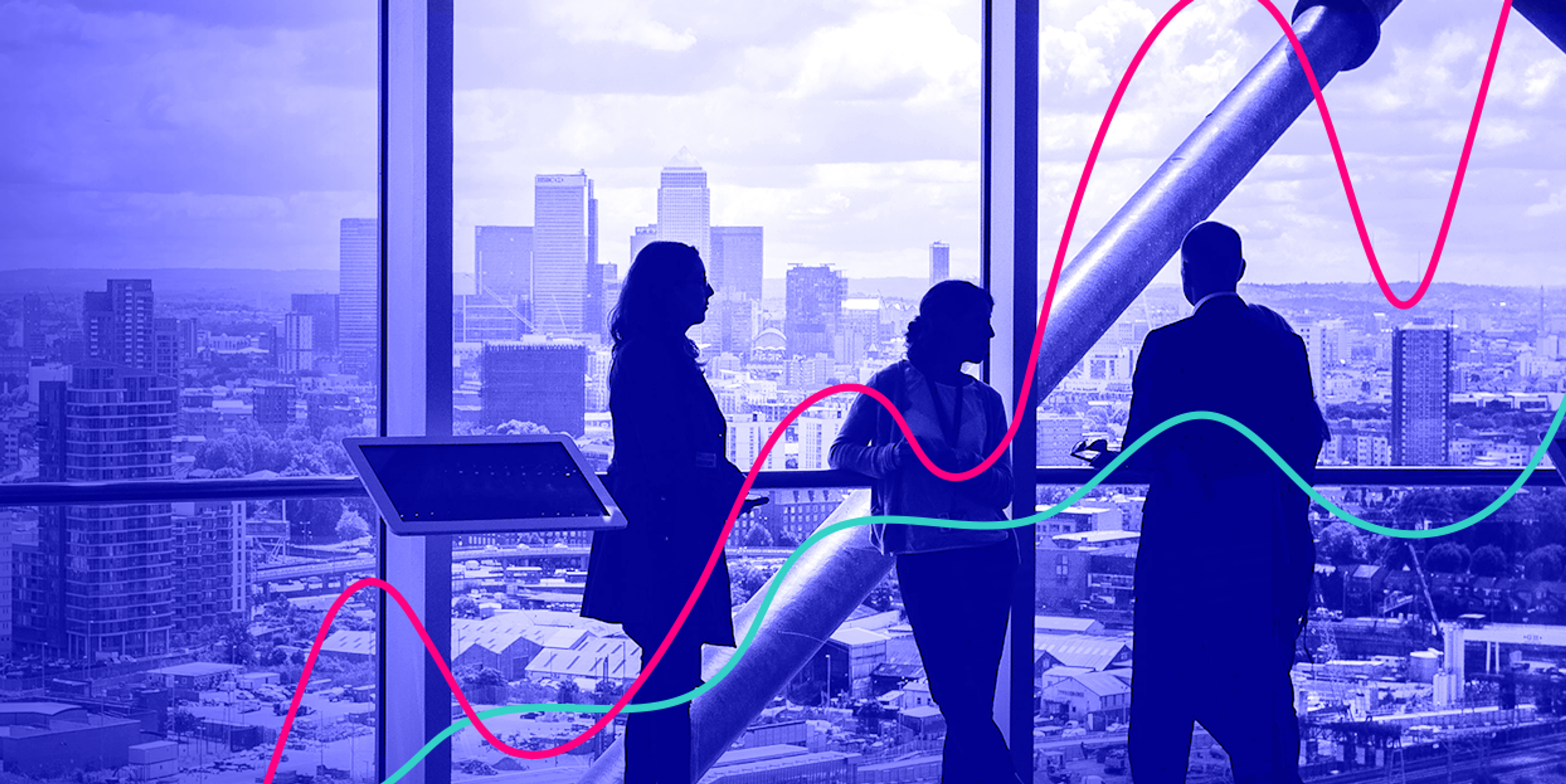 Coworkers looking out over a city landscape with an illustration of a chart imposed on top of them
