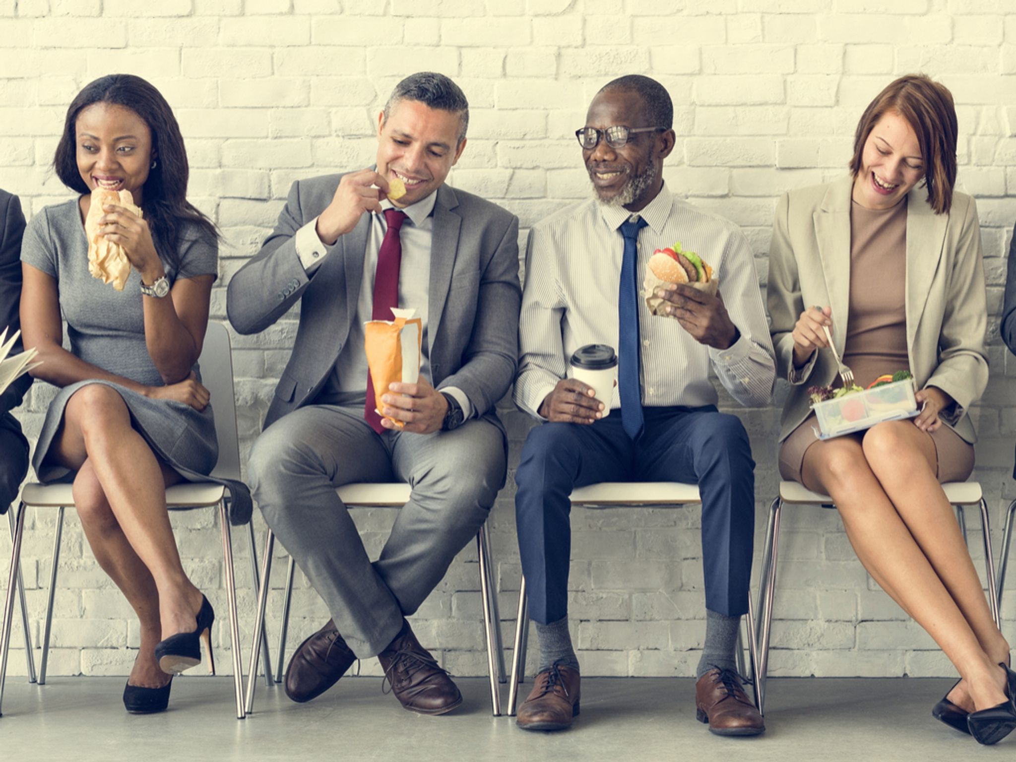 A photo of coworkers eating lunch