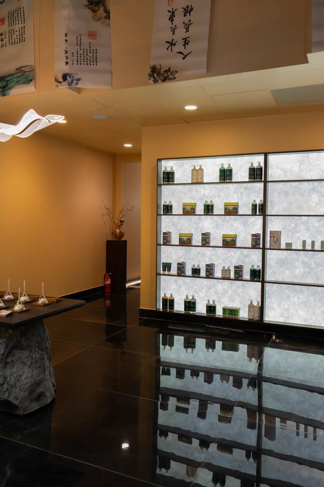 The skincare wall, warmly lit