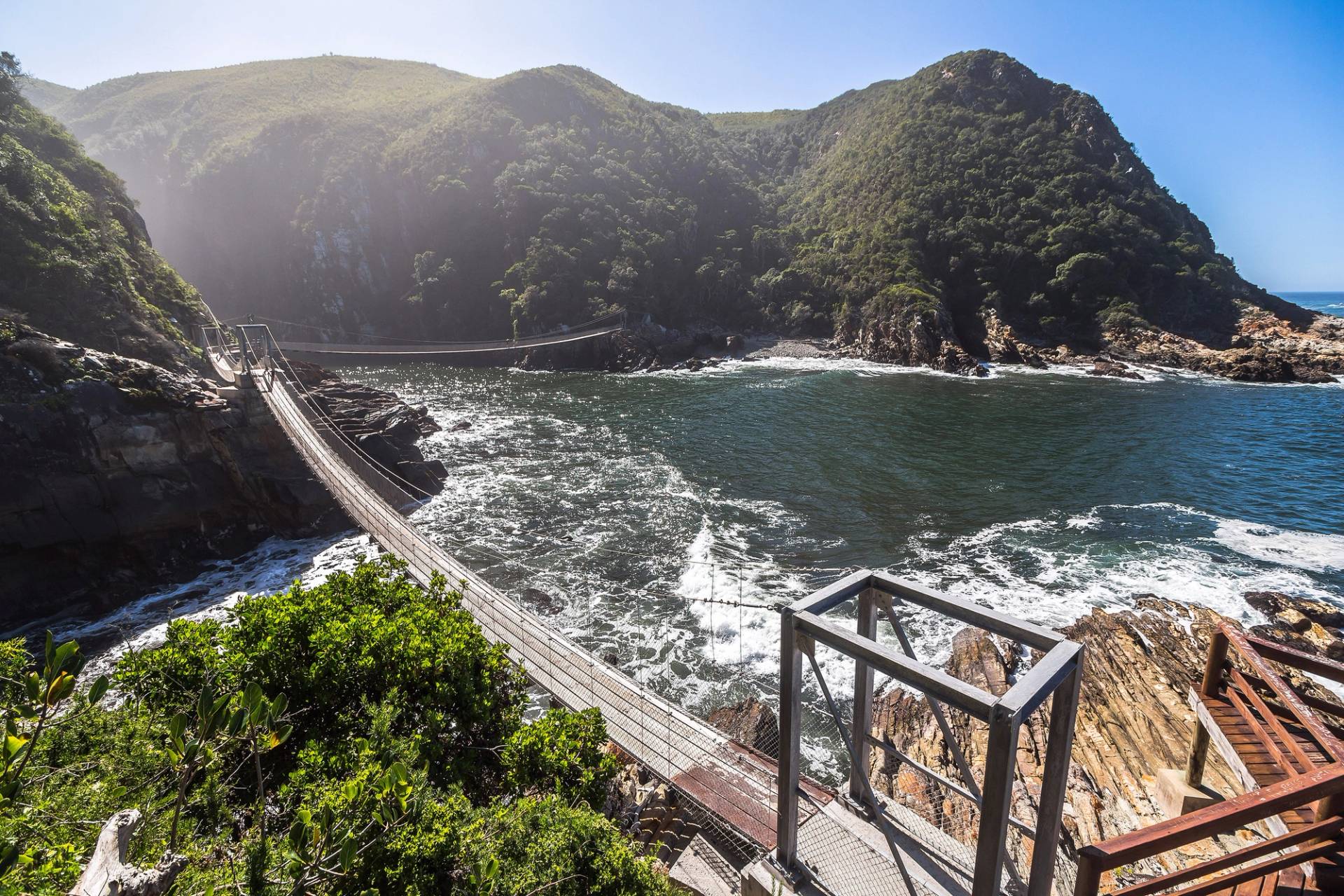 beach with a bridge