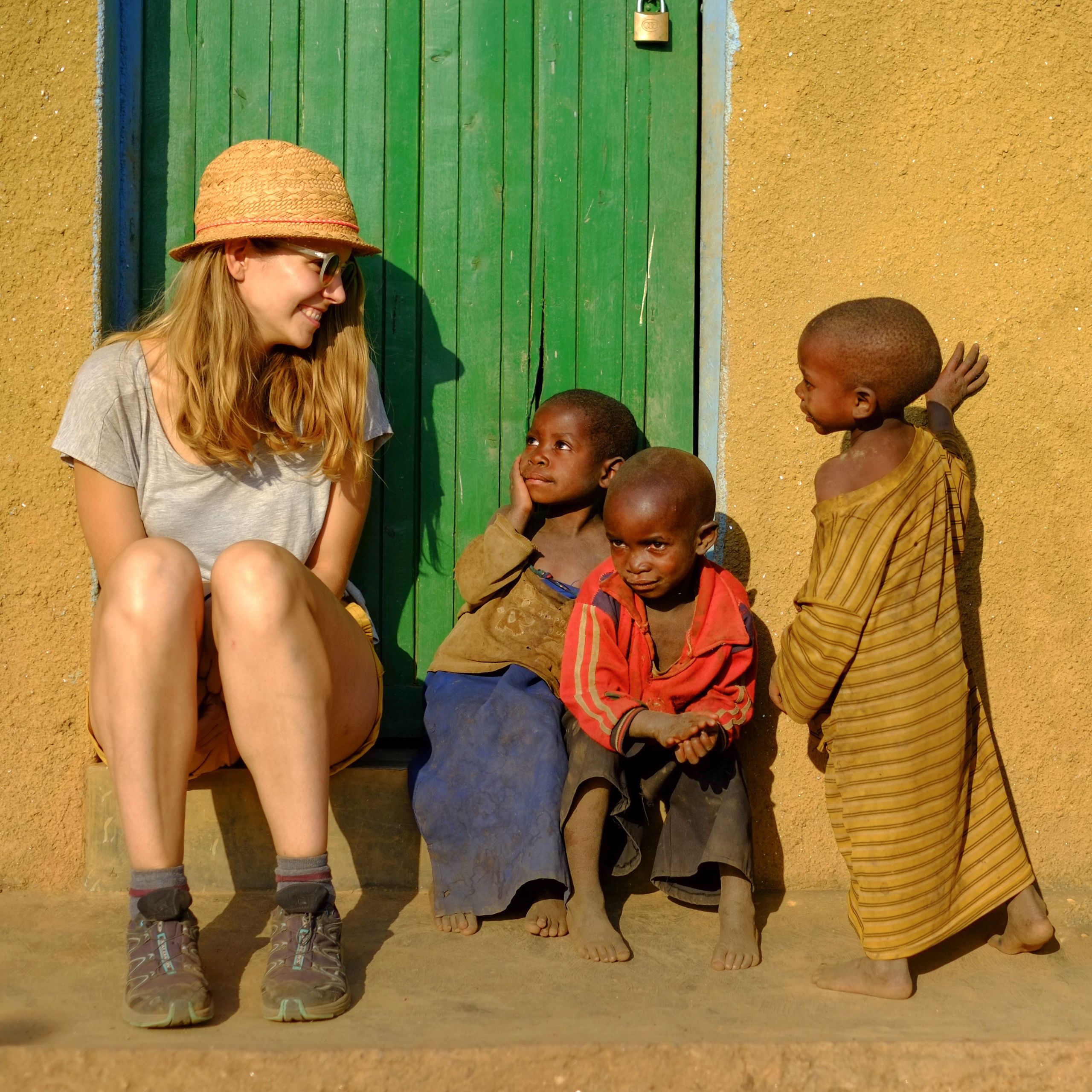 tourist with children in kibuye