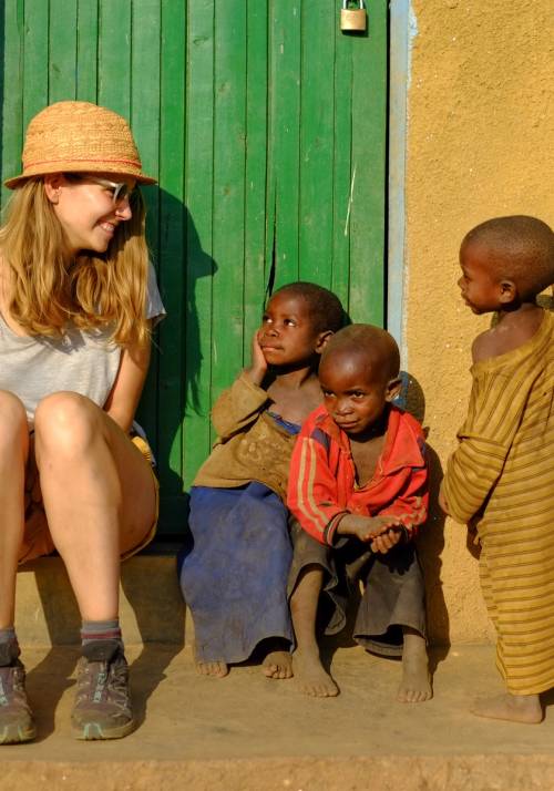tourist with children in kibuye