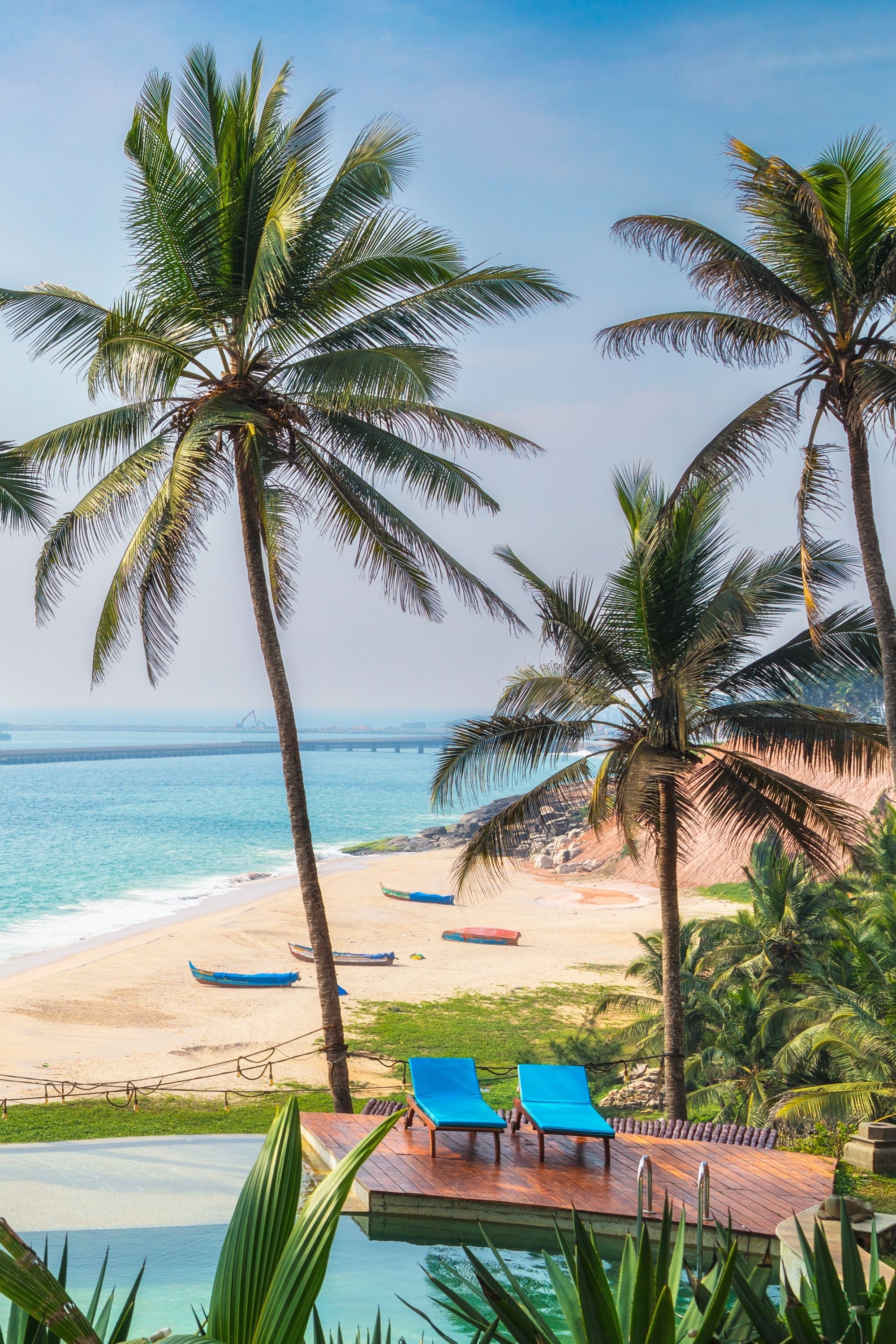 infinity pool with a view of the beach