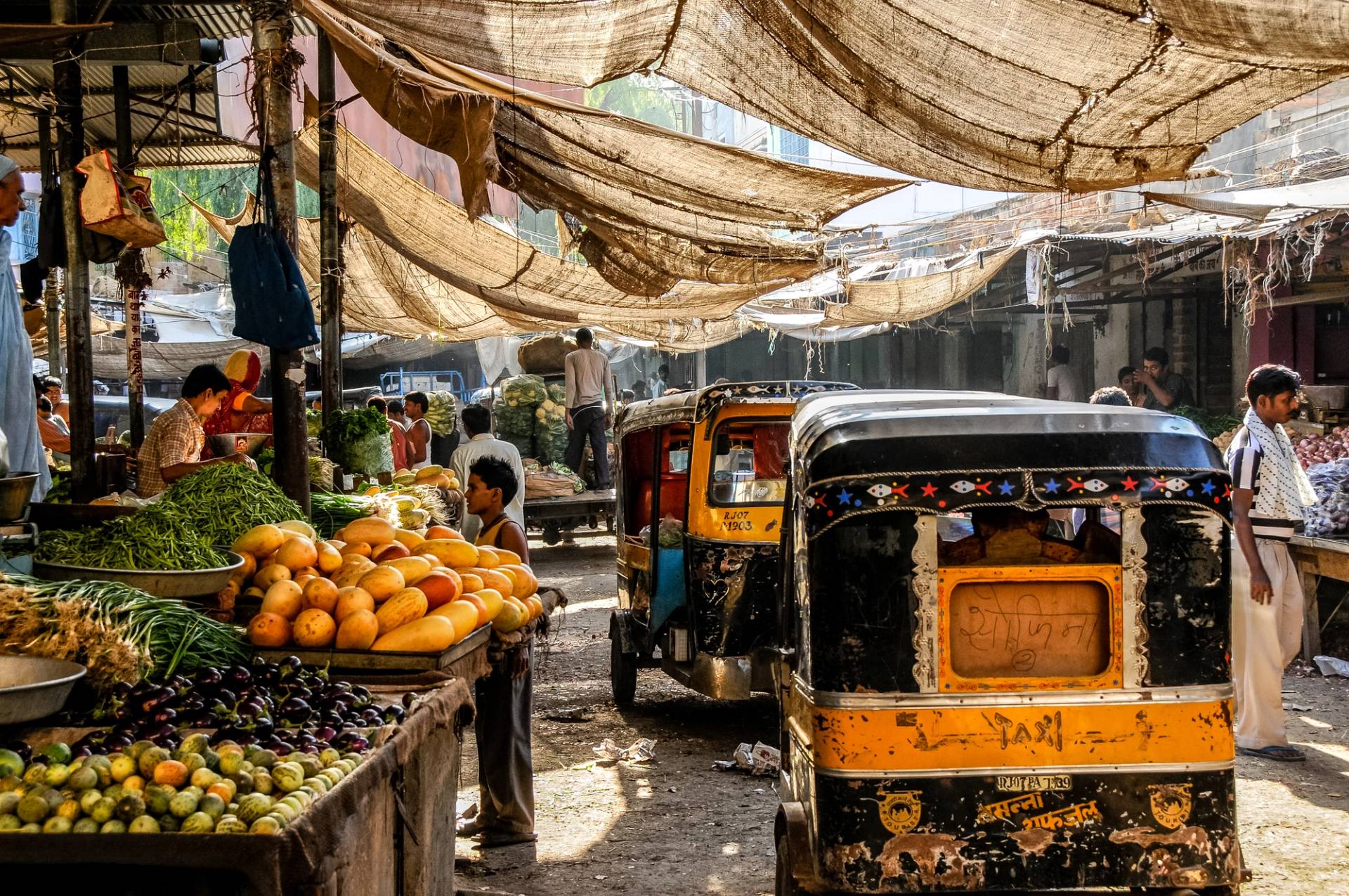 tuk-tuk in the middle of the market