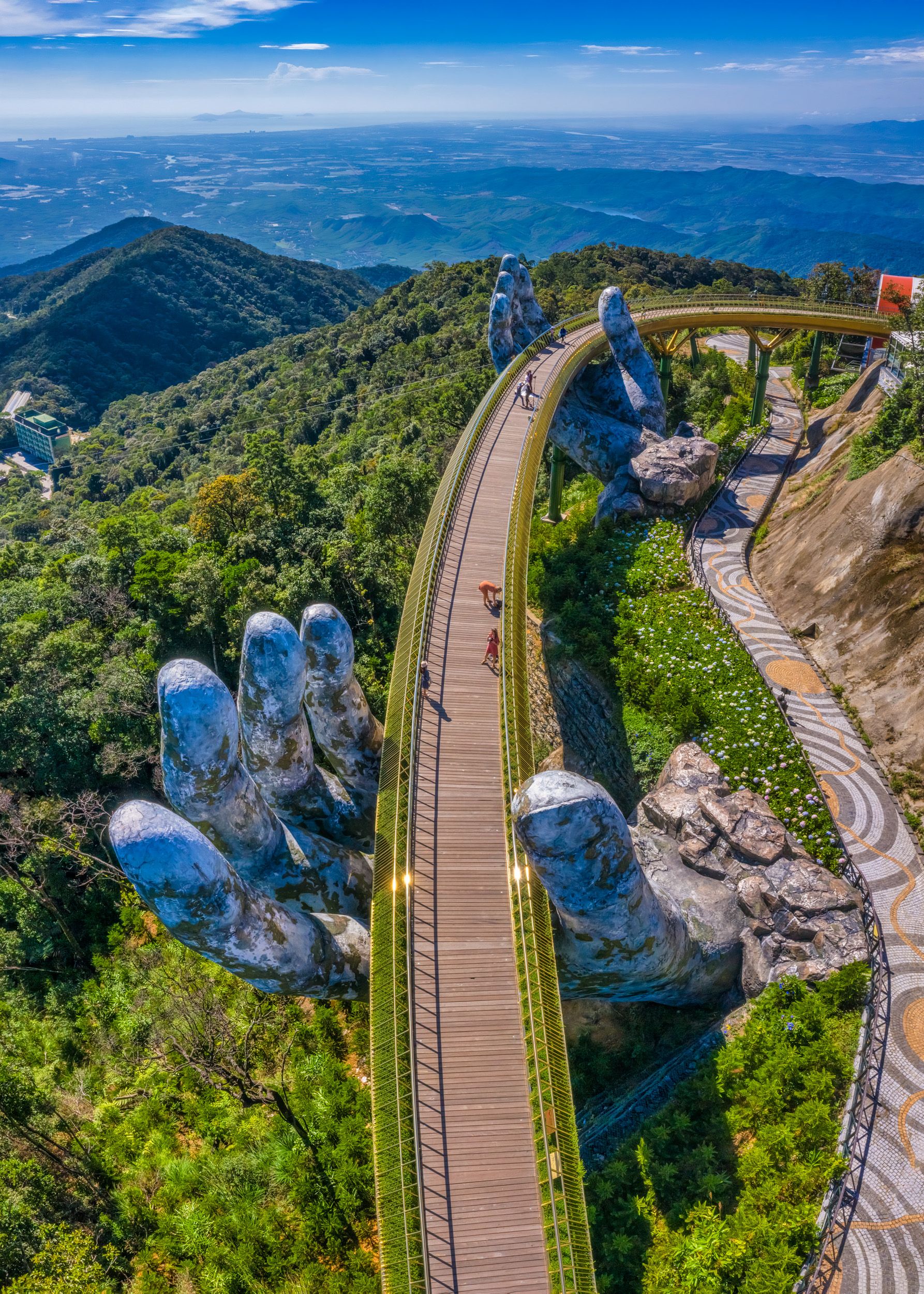 bridge supported by two hands