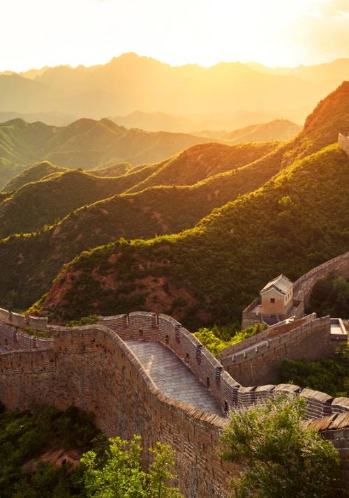 grande muraglia cinese al tramonto