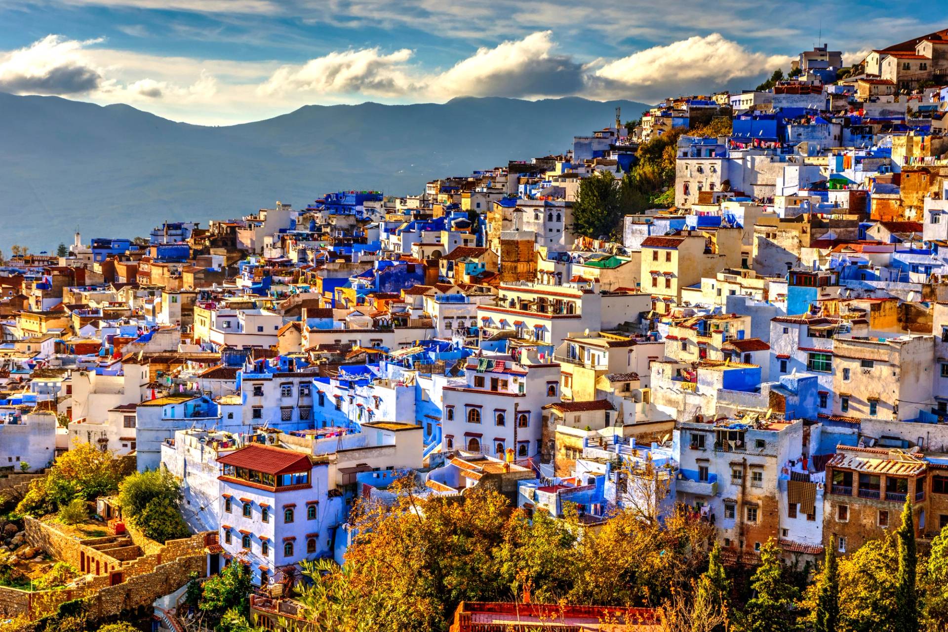 view of the city of Chefchaouen with mountains in the background