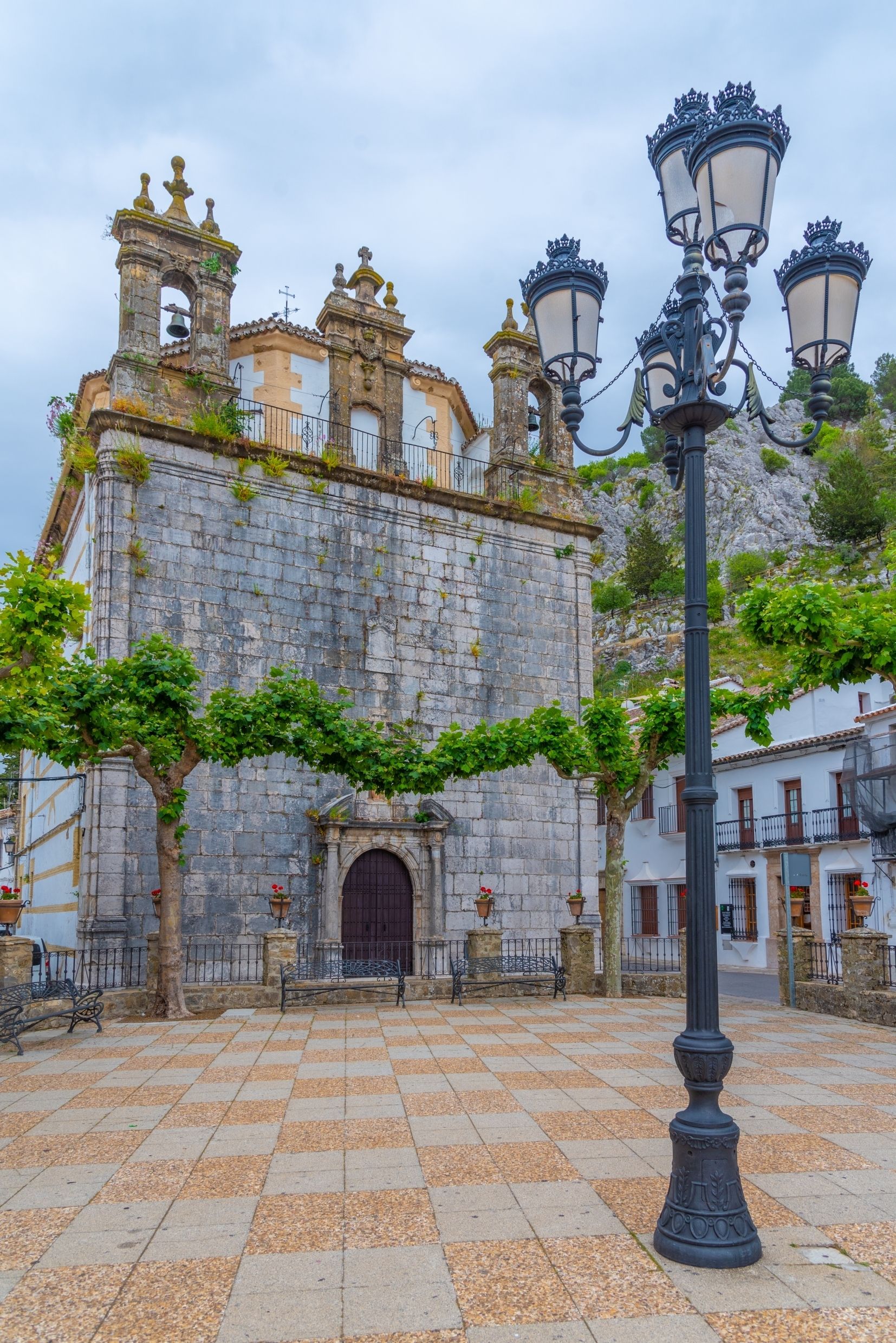 square with streetlight and church