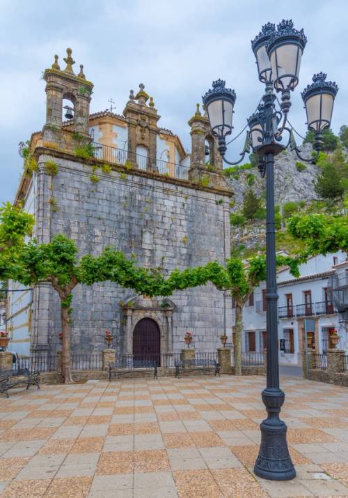 square with streetlight and church