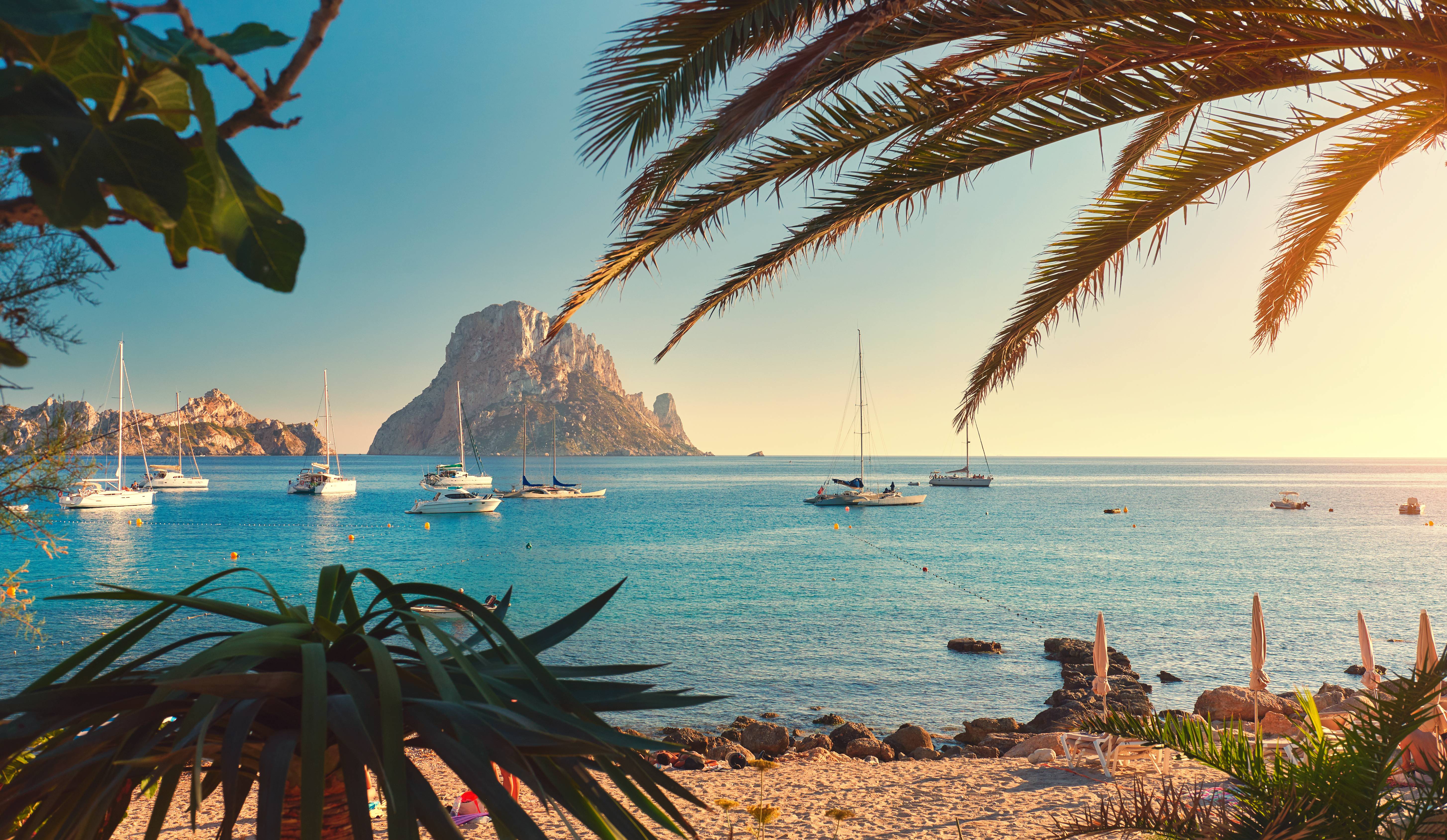cala dhort beach at sunset