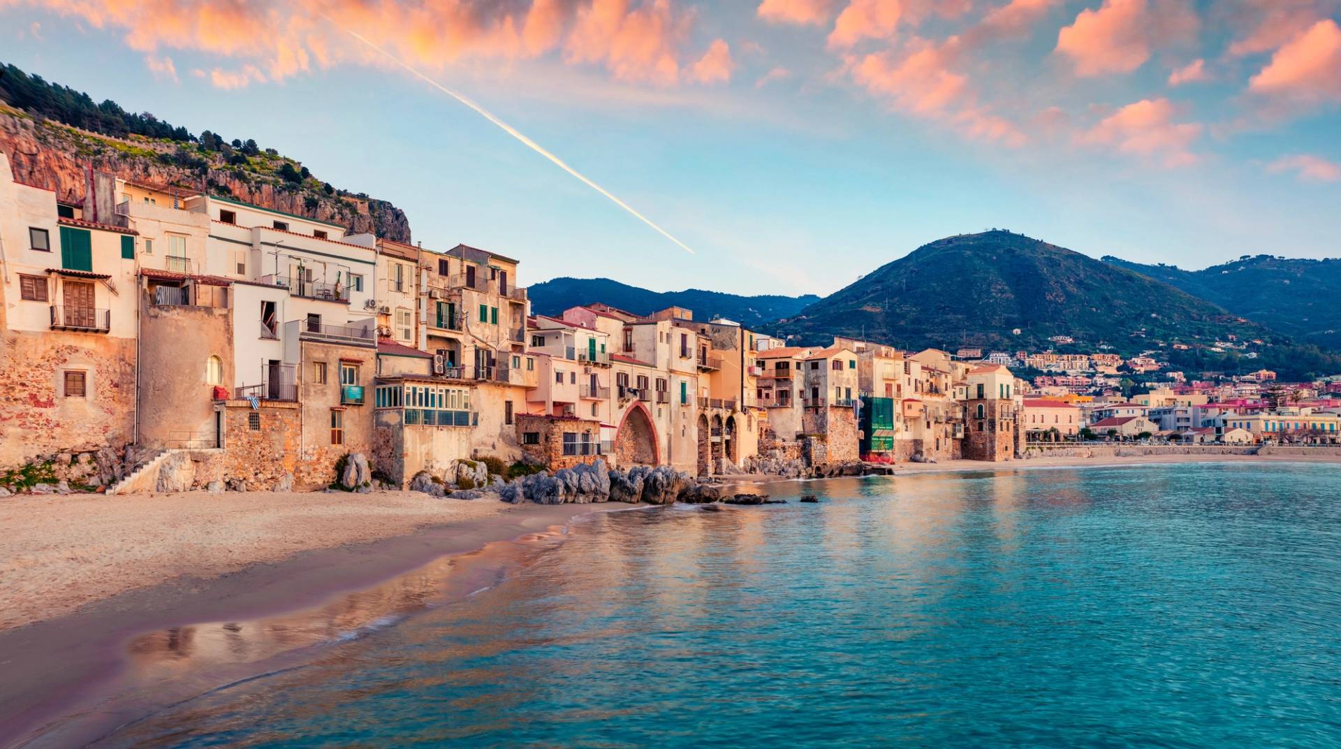 Cefalu harbor at sunset