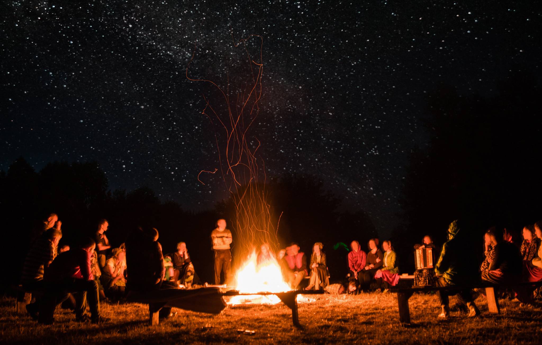 group around the fire