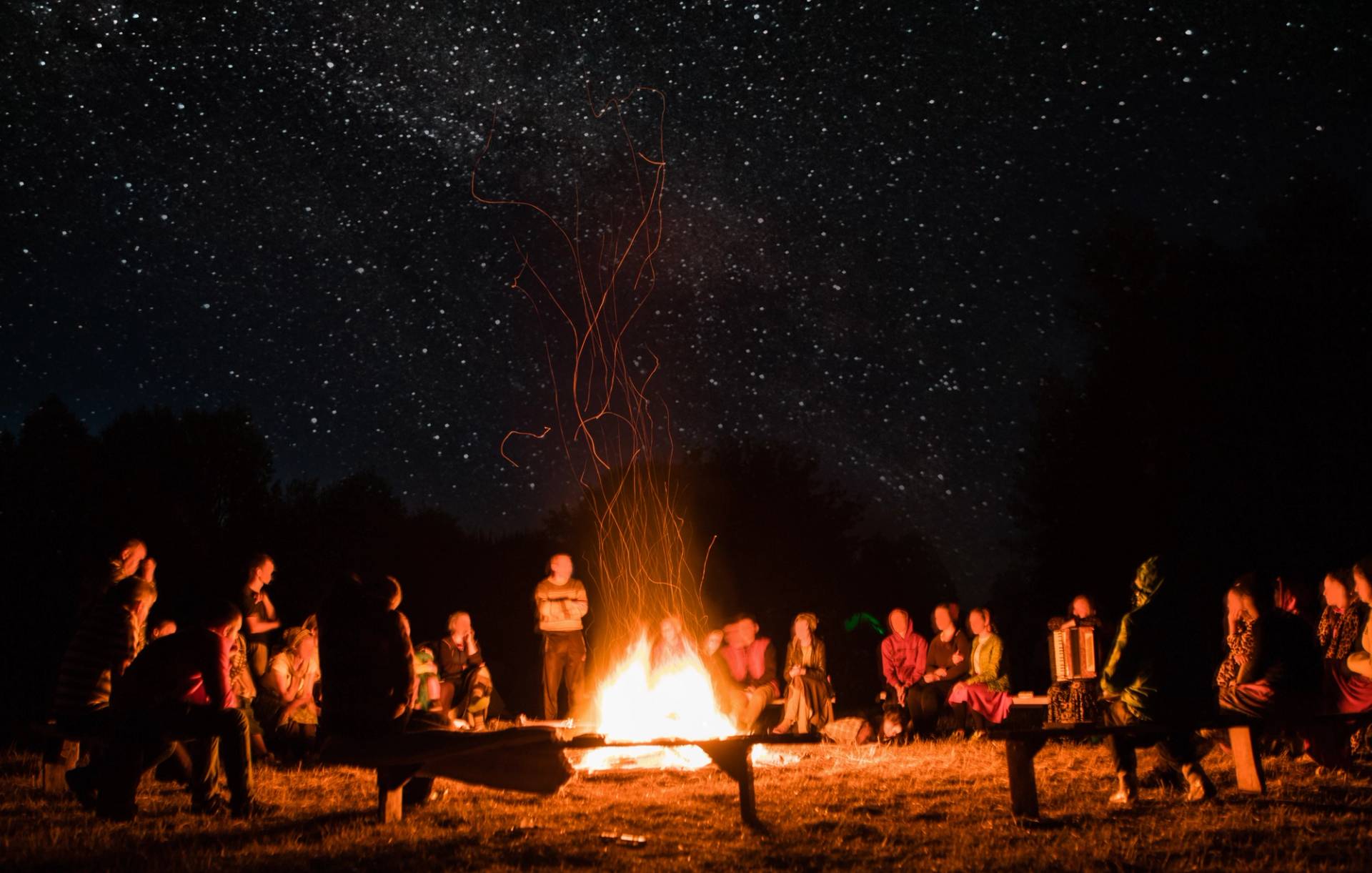 group around the fire