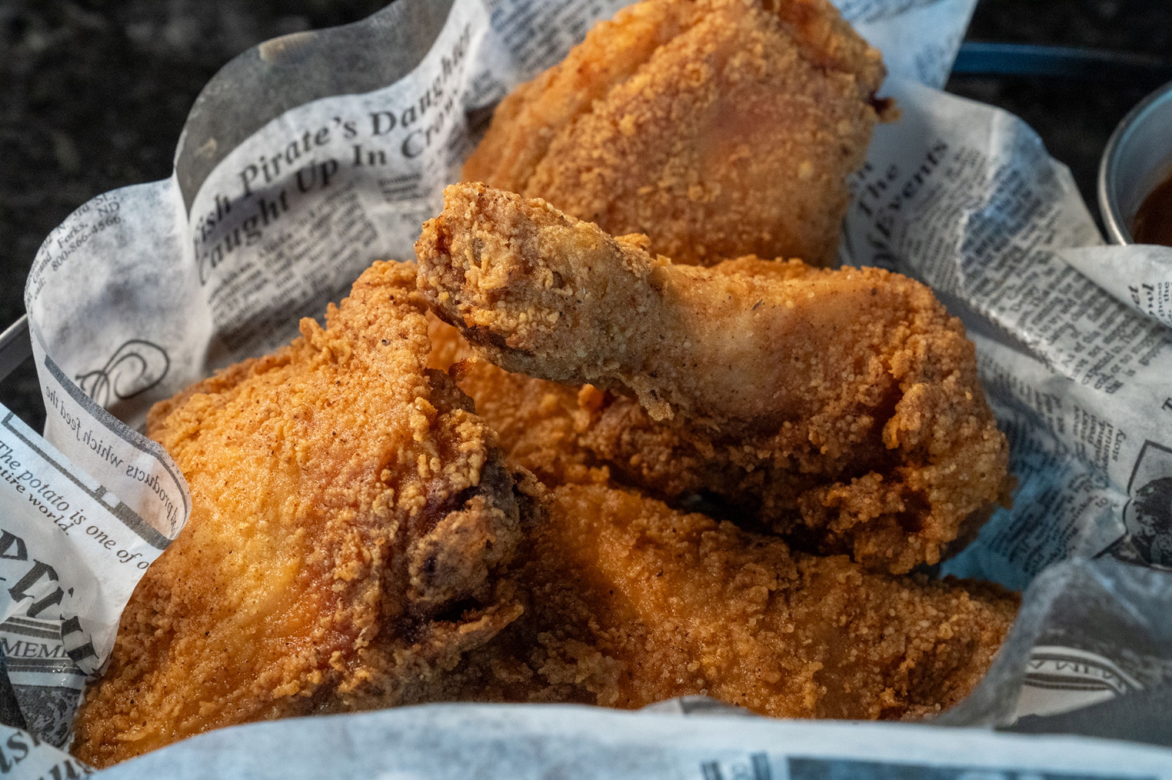 Fried chicken in a paper-lined basket