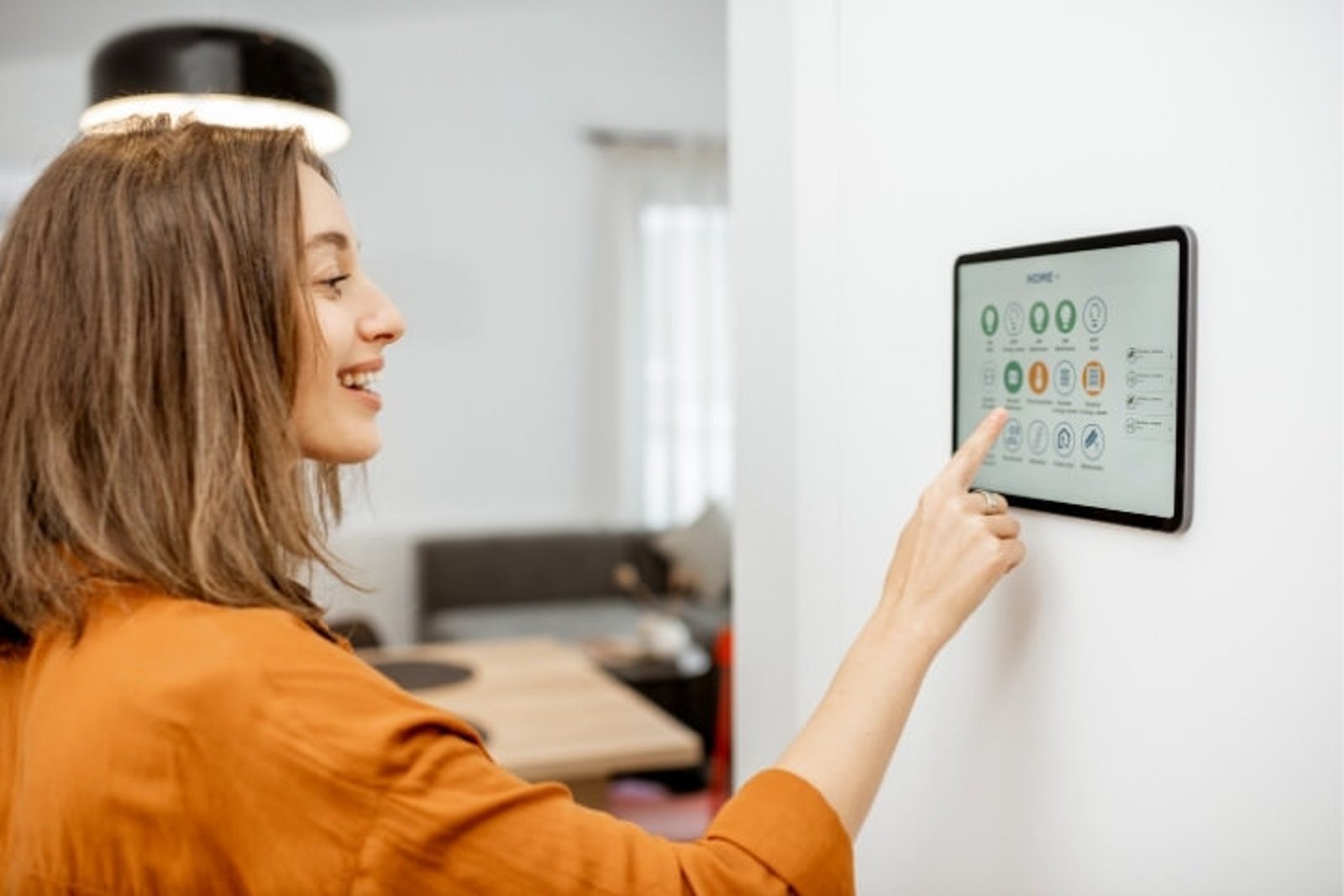 Homeowner using smart controls for pool automation features