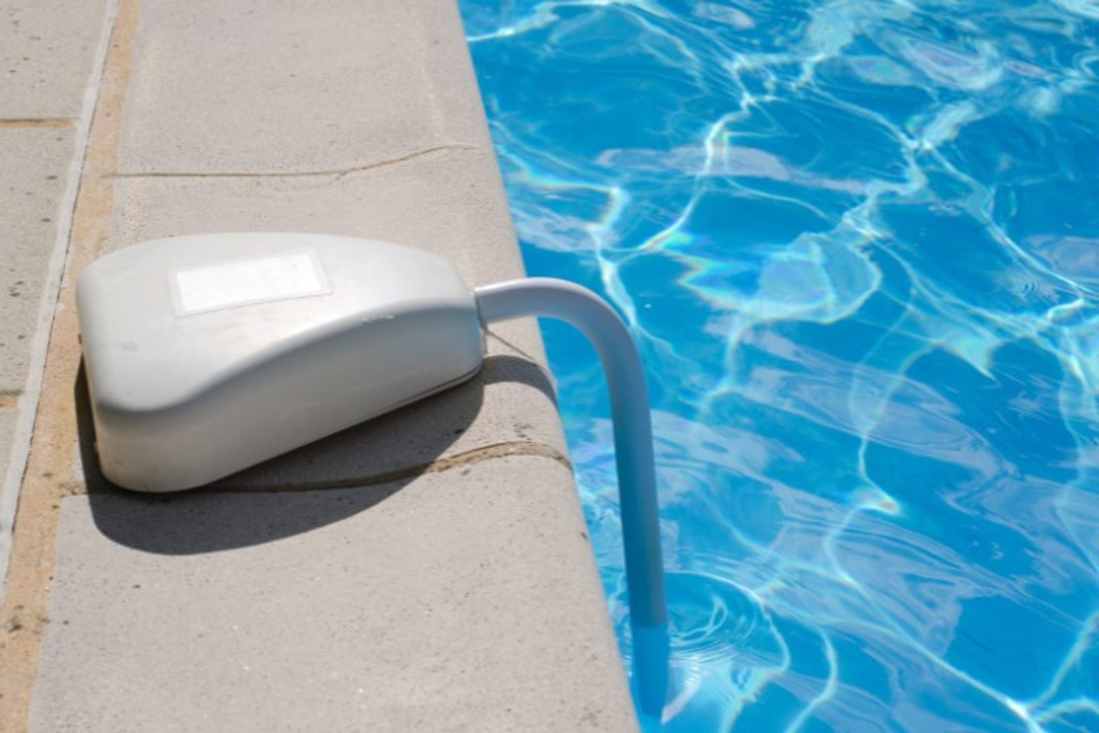 Pool alarm device installed on the pool edge as a safety feature