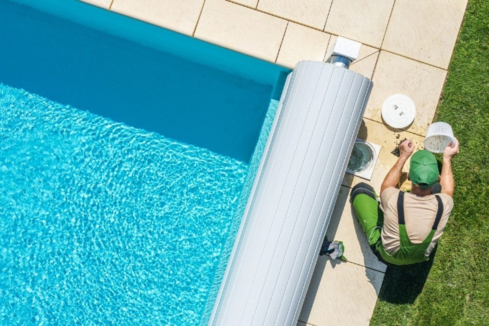 pool technician cleaning pool filter