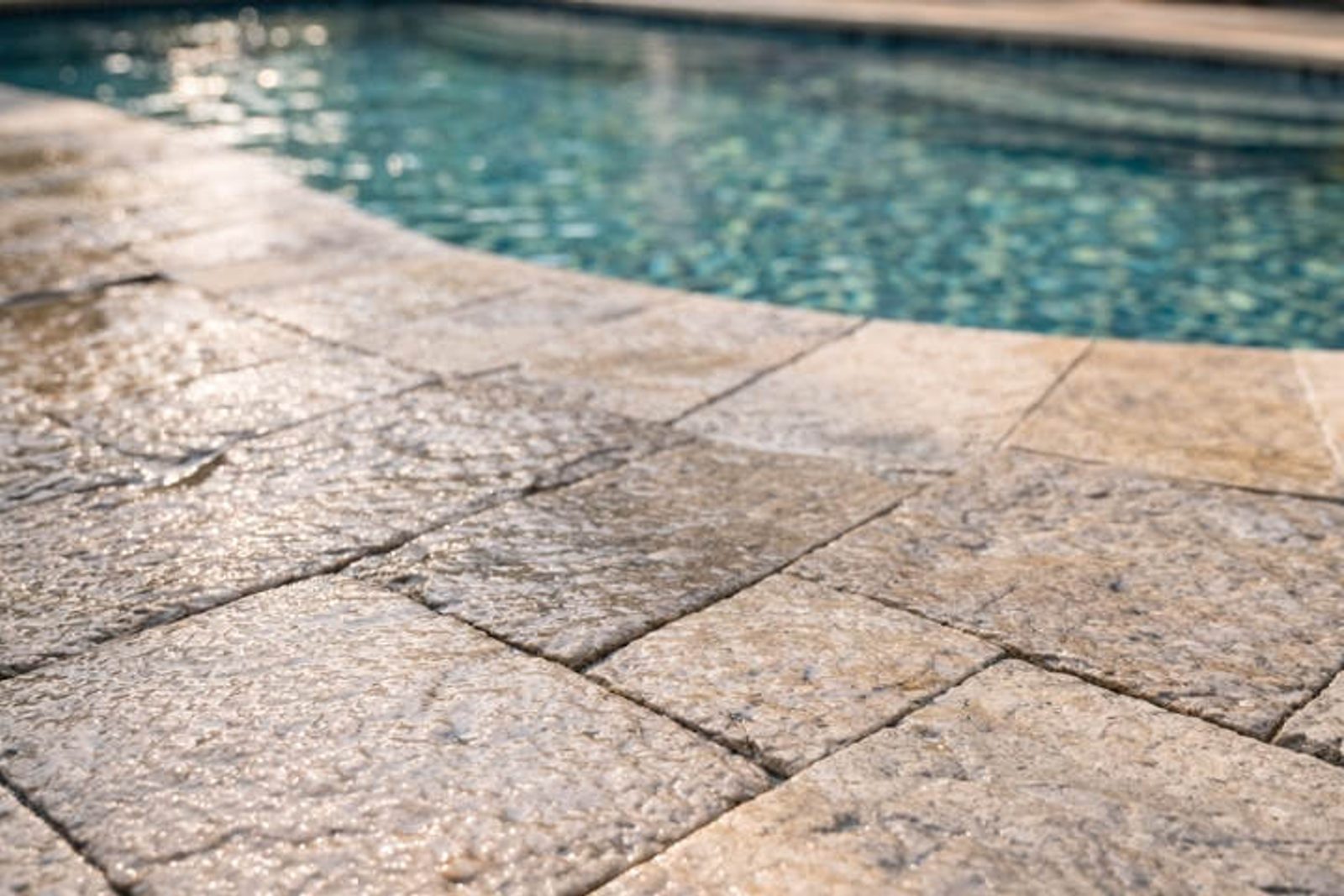 Wet brick pool deck showing texture, durability, and slip resistant character