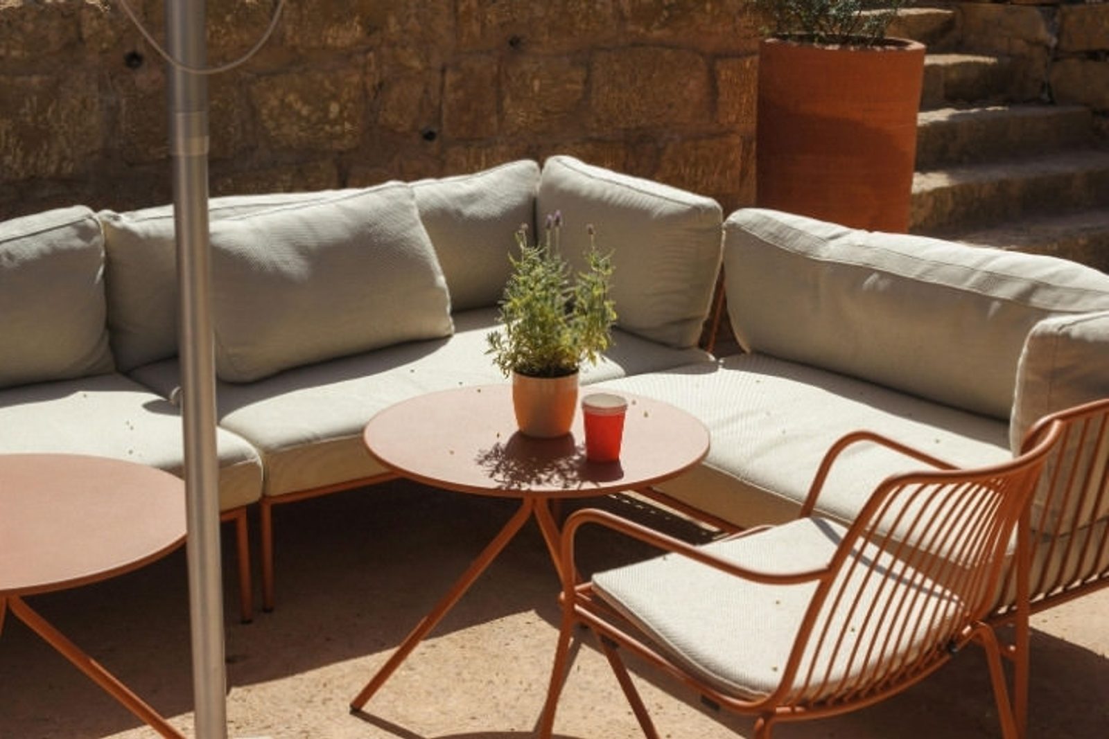 Modern outdoor lounge seating with cushioned furniture for a stylish Houston backyard living space