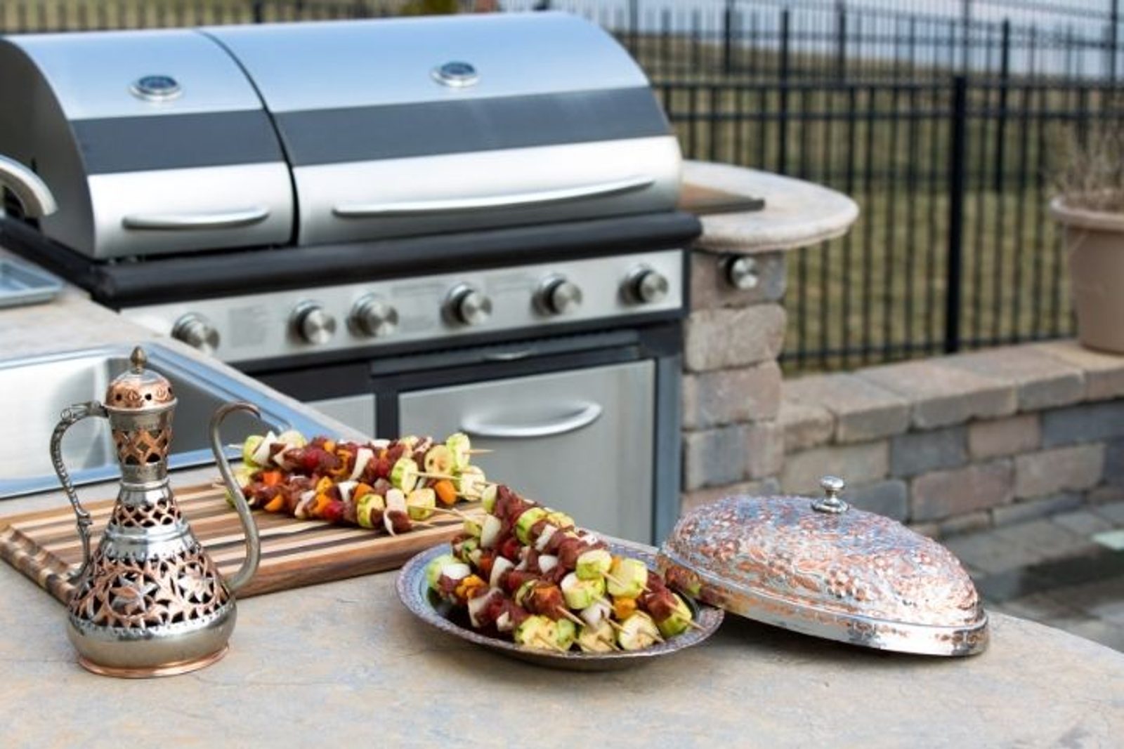 Built in stainless steel grill and weatherproof countertop