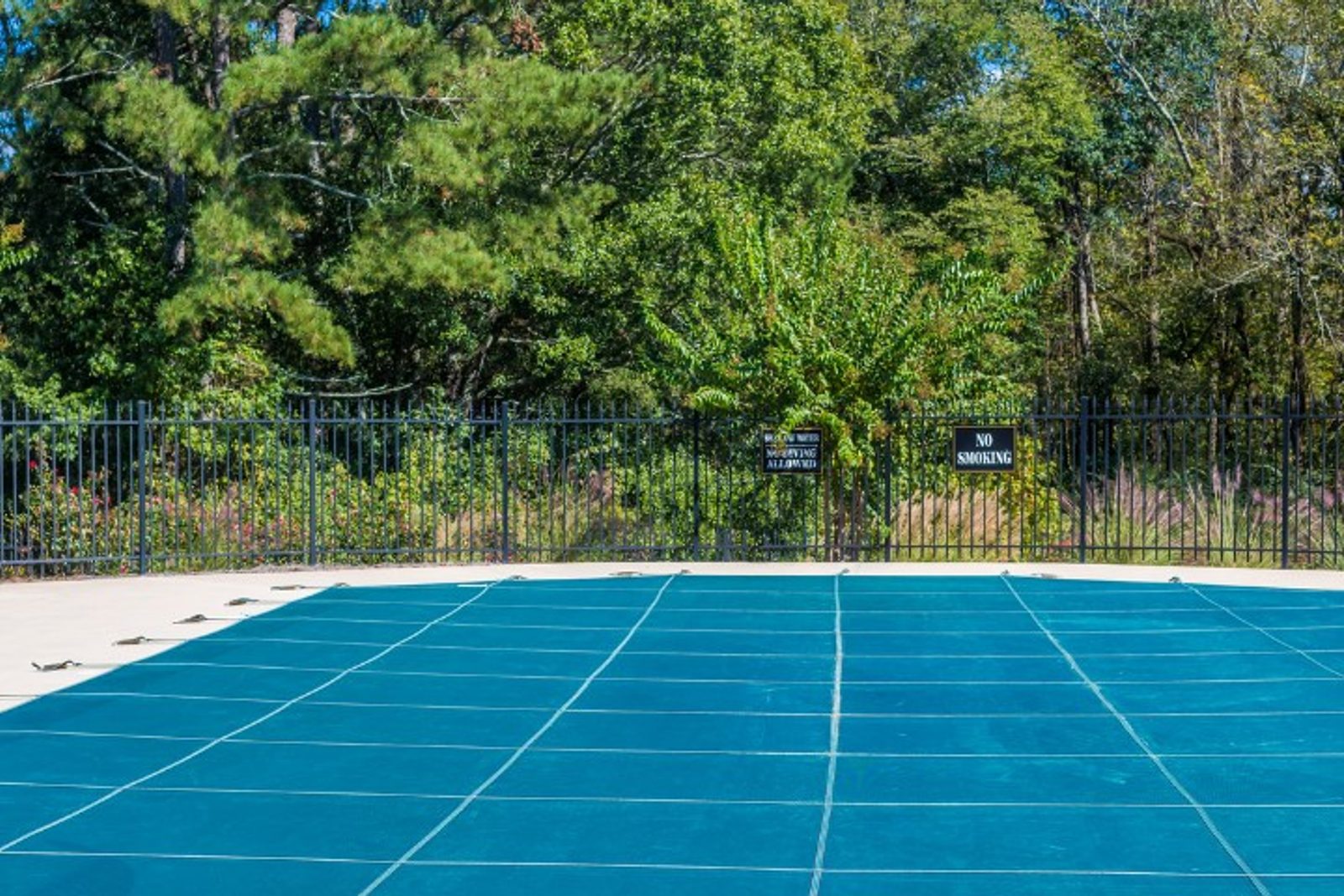 Pool covered with a safety cover to help prevent accidents
