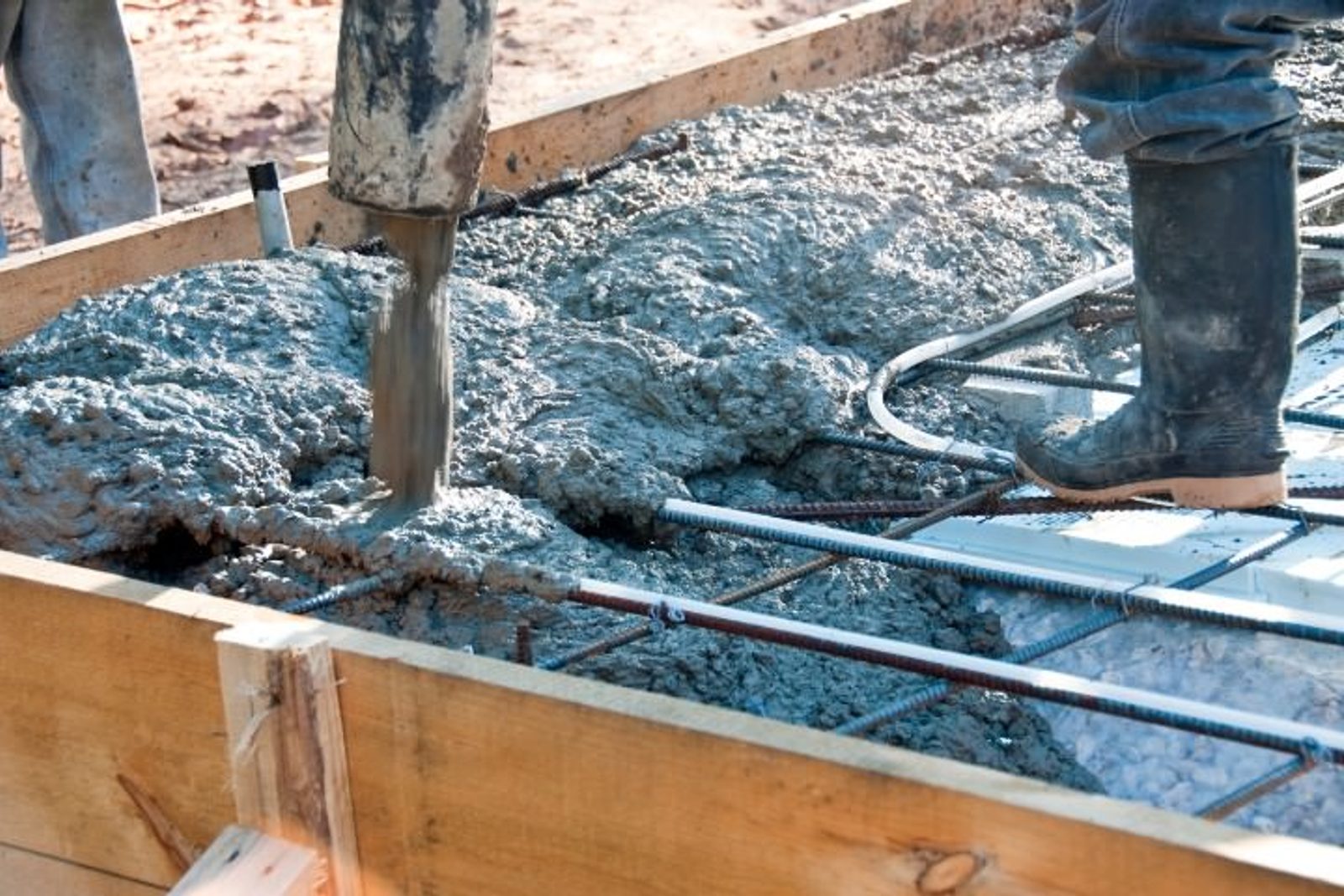Shotcrete application reinforcing pool structure as part of the building process