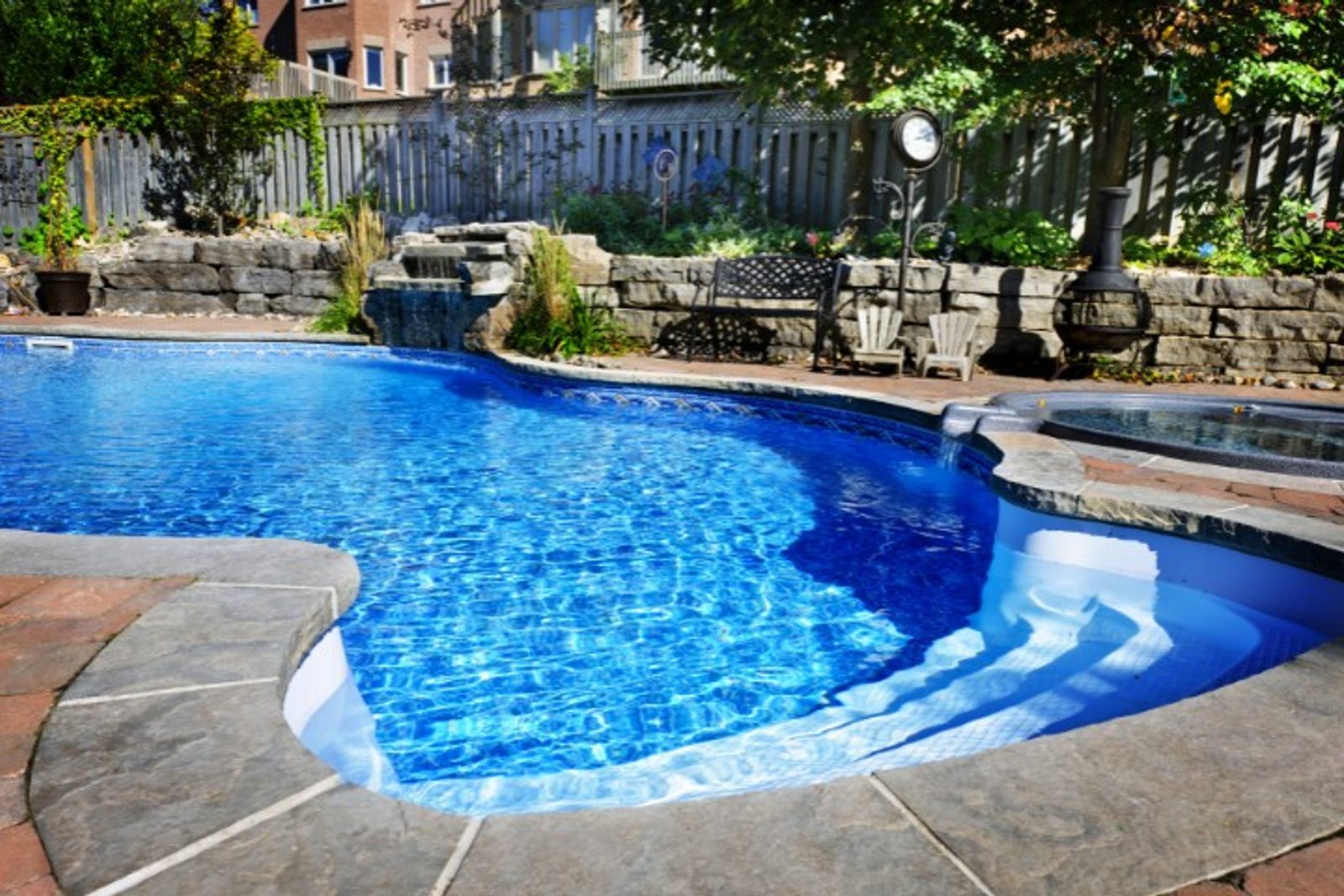 Elegant backyard pool in freeform design