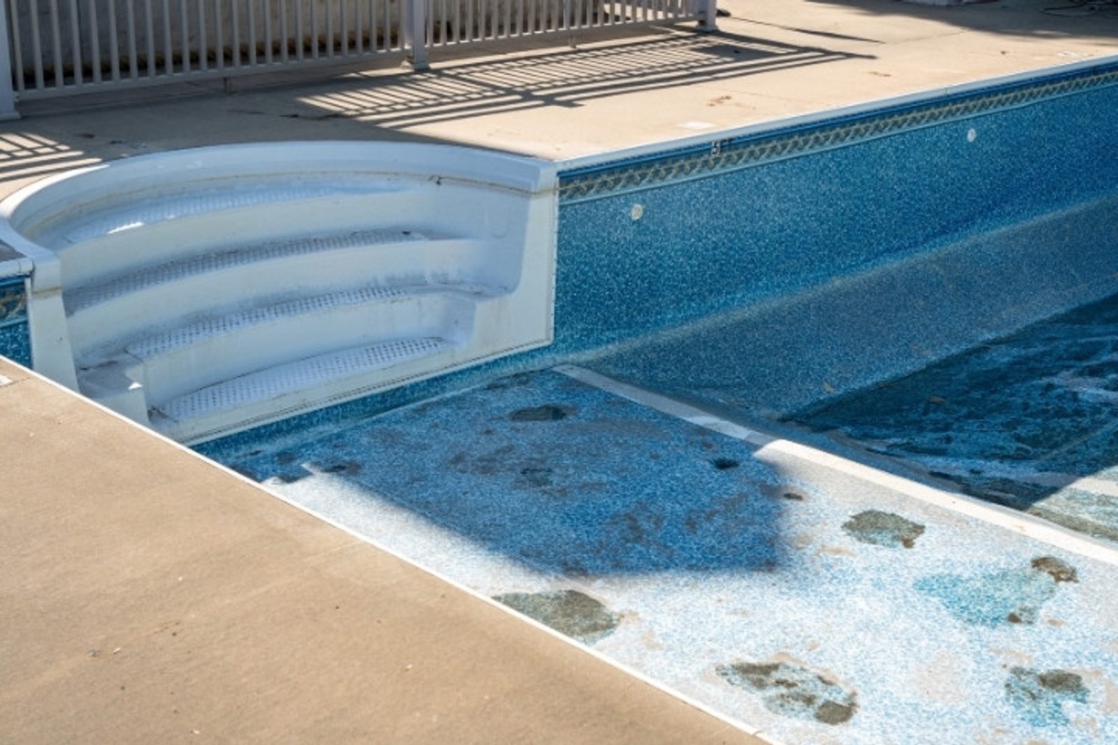 Existing swimming pool evaluated for infinity pool renovation and upgrades