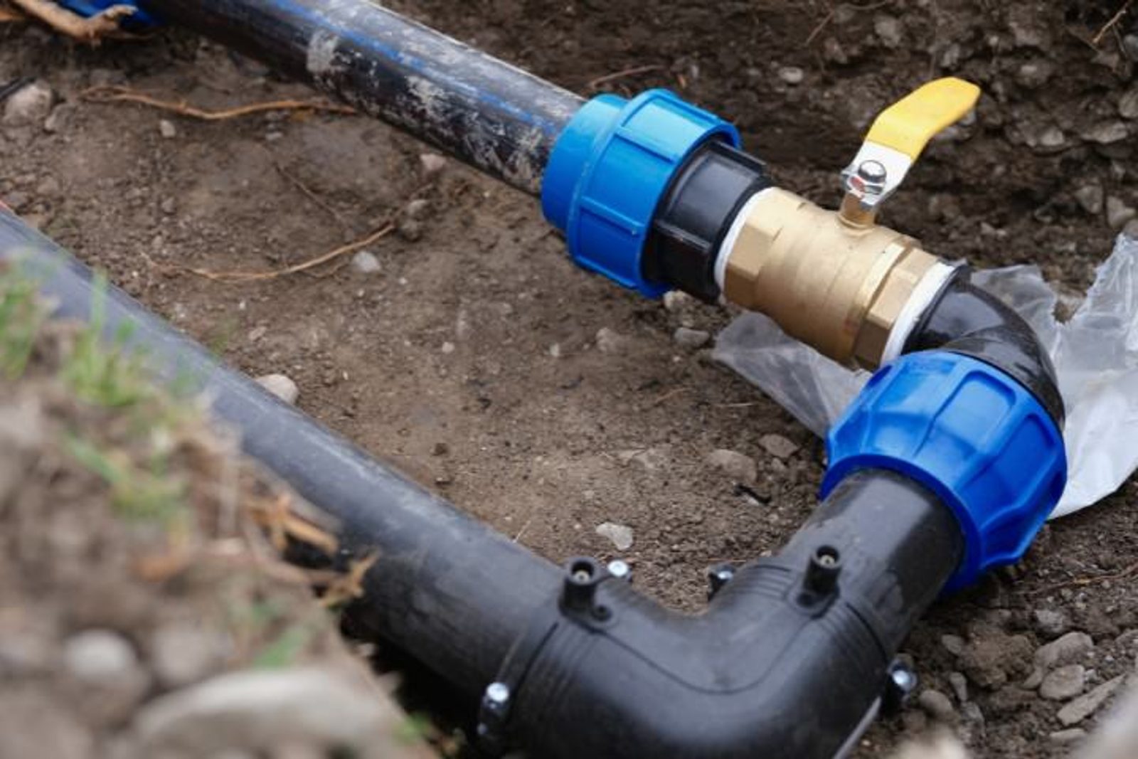 Plumbing lines installation phase in residential pool building