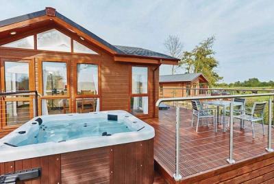 View of Lodges with Hot Tubs and Log Cabin Holidays