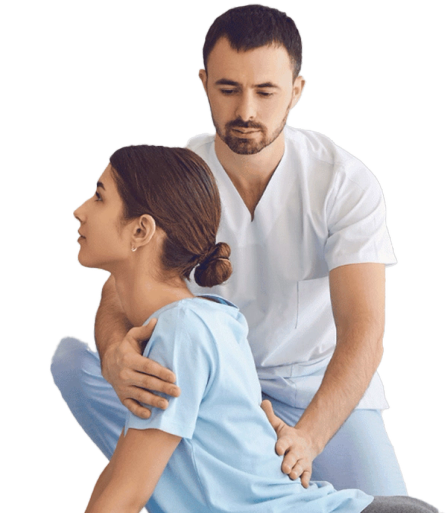 Chiropractor checking patient's back