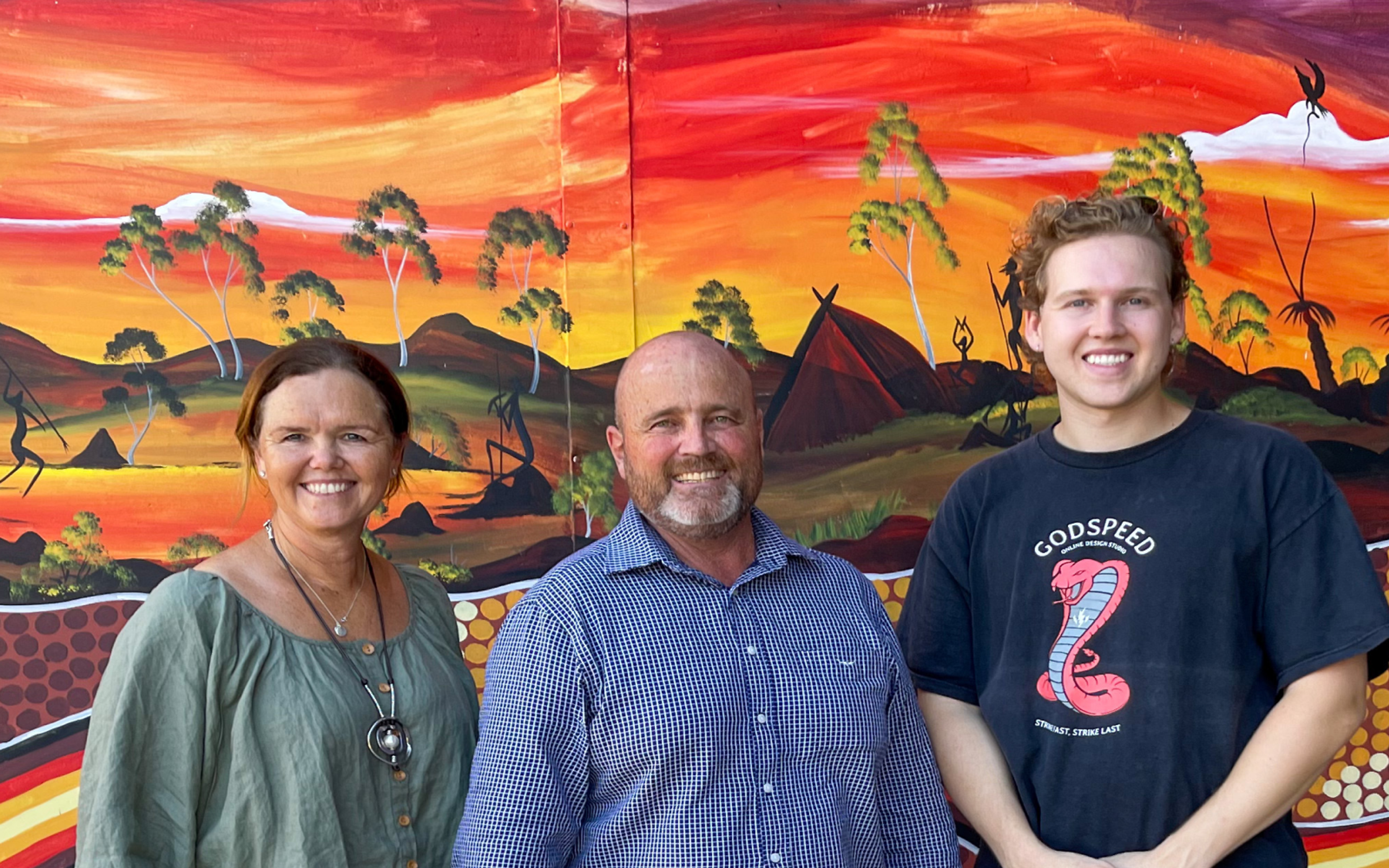 Two staff and the principal of Woorabinda State School
