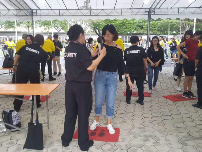 SSIS personnel supporting entry screening at a stadium deployment