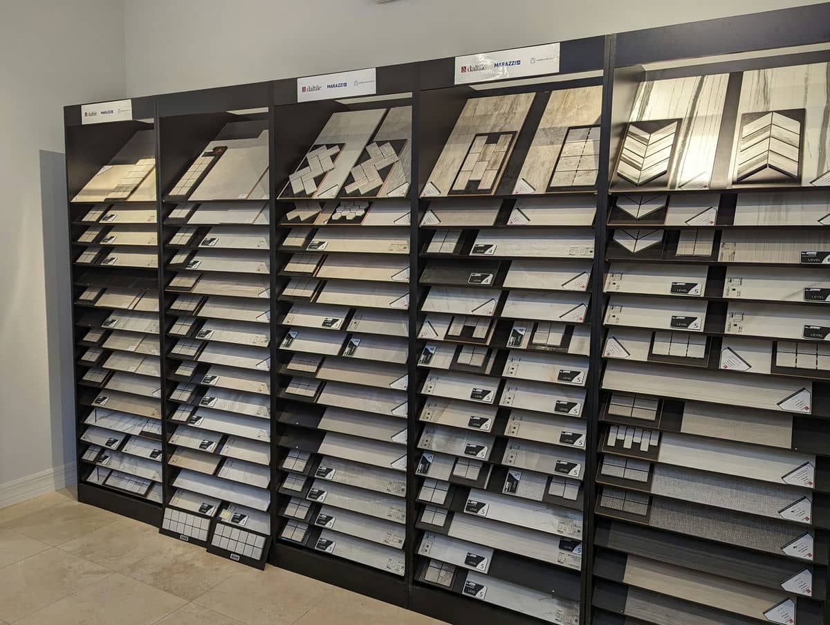 Wall of tile and stone samples in the design studio