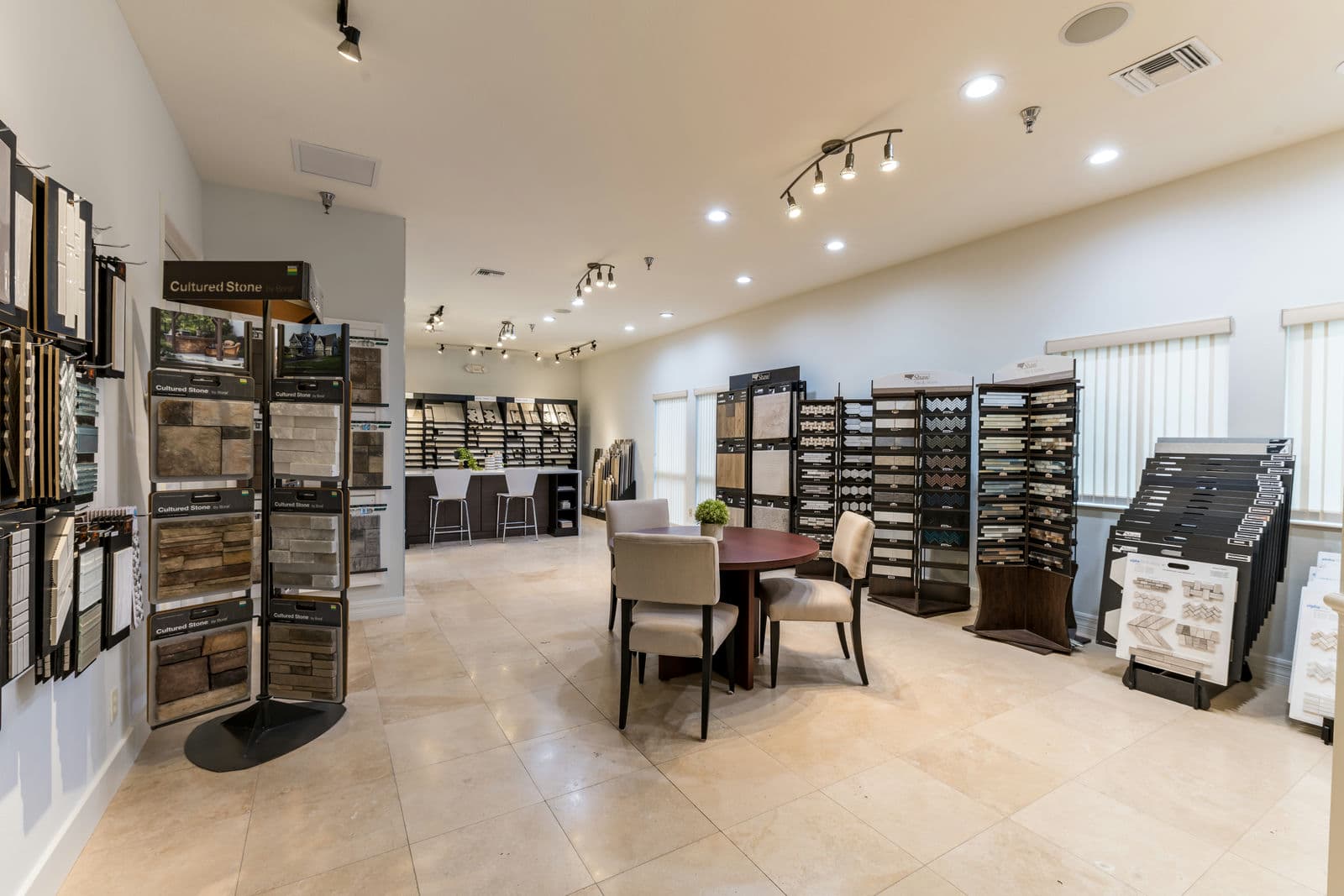 Sam Rodgers design studio with stone and tile selection displays