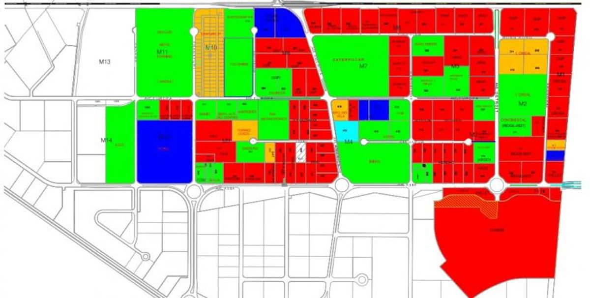 Plano general de parque industrial mostrando división de lotes por colores y trazado vial