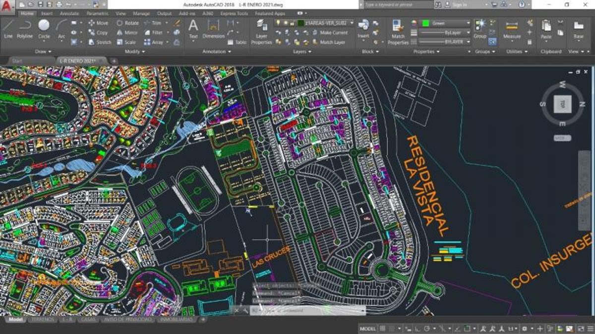 Plano urbano digital en AutoCAD con trazado de calles, lotes residenciales y áreas deportivas