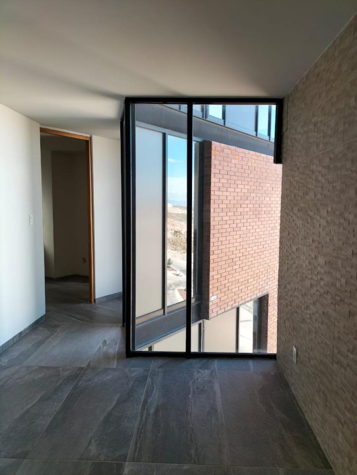 Fotografía de DEPARTAMENTO EN VENTA EN LOMAS DEL PEDREGAL CON VISTA A LA CIUDAD