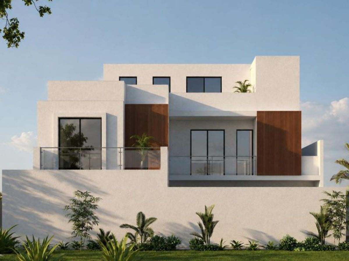 Fachada blanca moderna con paneles de madera, balcones de cristal y jardín frontal