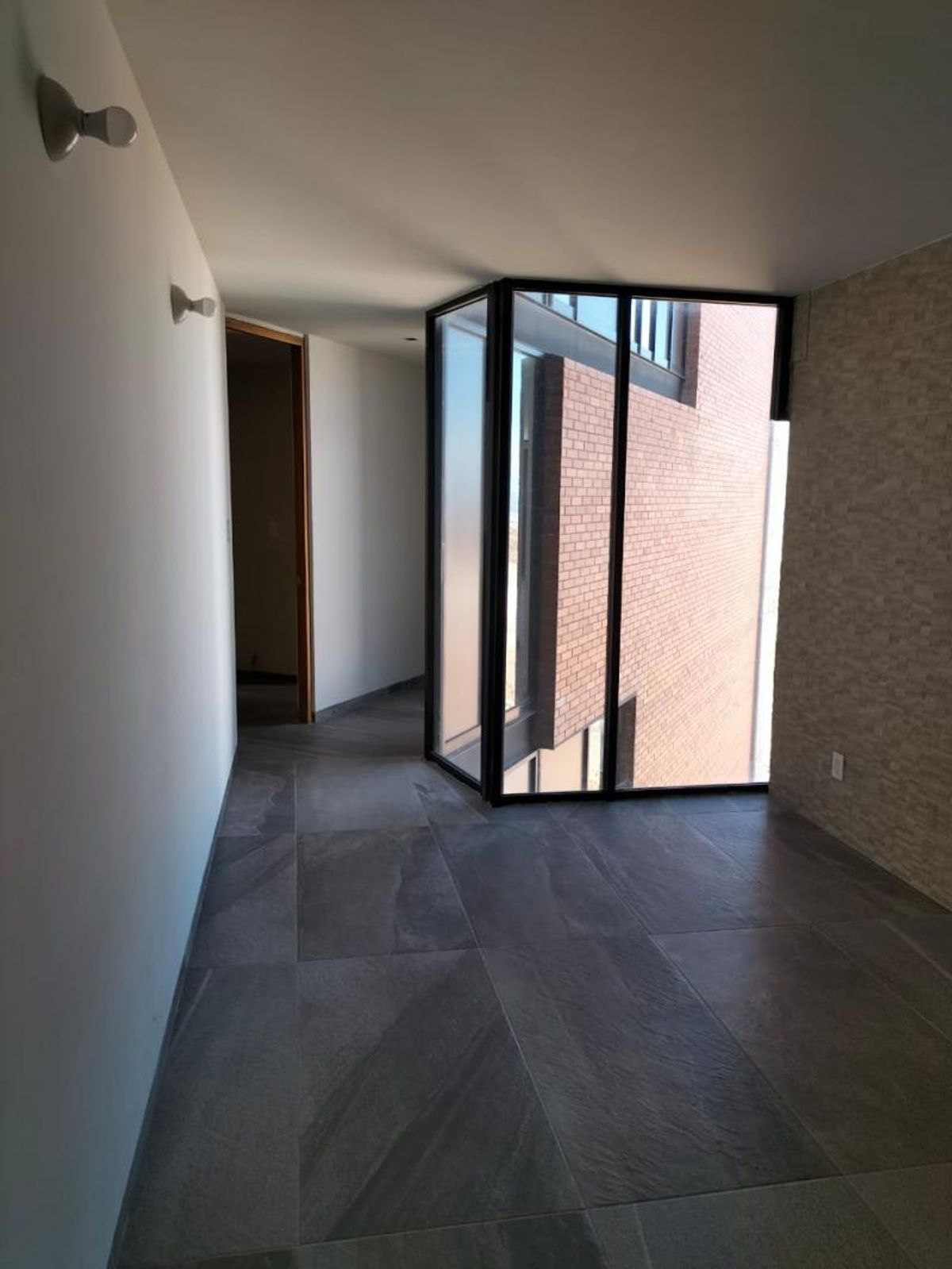 Fotografía de DEPARTAMENTO EN VENTA EN LOMAS DEL PEDREGAL CON VISTA A LA CIUDAD